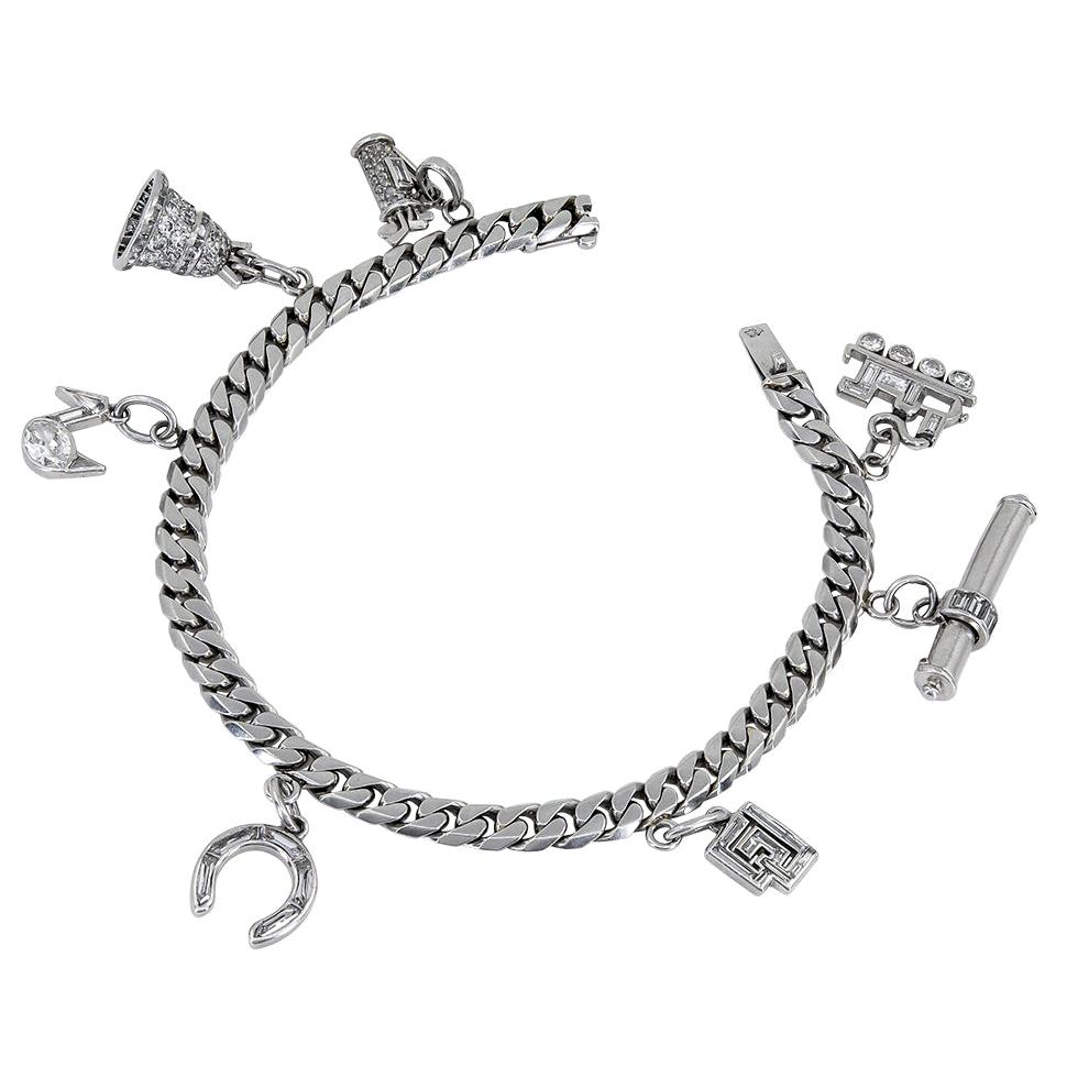 Cartier and Van Cleef & Arpels Diamond Charm Bracelet For Sale