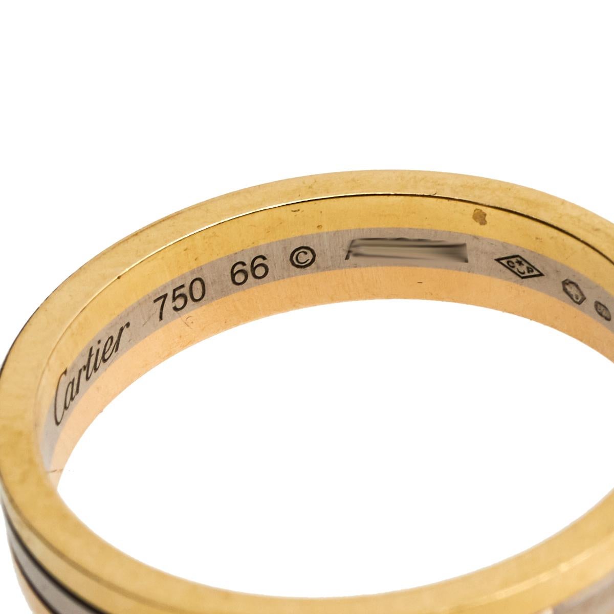 Let this elegant wedding ring by Loius Vuitton sit on your finger and beautifully complement your ensembles. The creation comes in 18k gold and features an assembly of three bands stacked together. The ring flaunts beautiful tones of gold — rose,