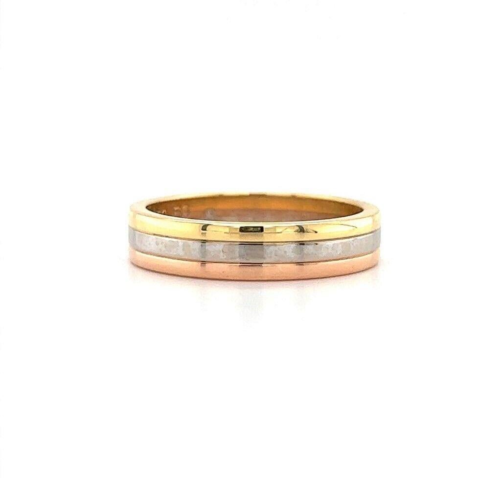 Cartier Vendome Louis 18k Yellow White and Rose Gold Wedding Band Ring Size 9

Condition:  Excellent Condition, Professionally Cleaned and Polished
Metal:  18k Gold (Marked, and Professionally Tested)
Weight:  7.6g
Width:  4.5mm
Size	:  9
Markings: 