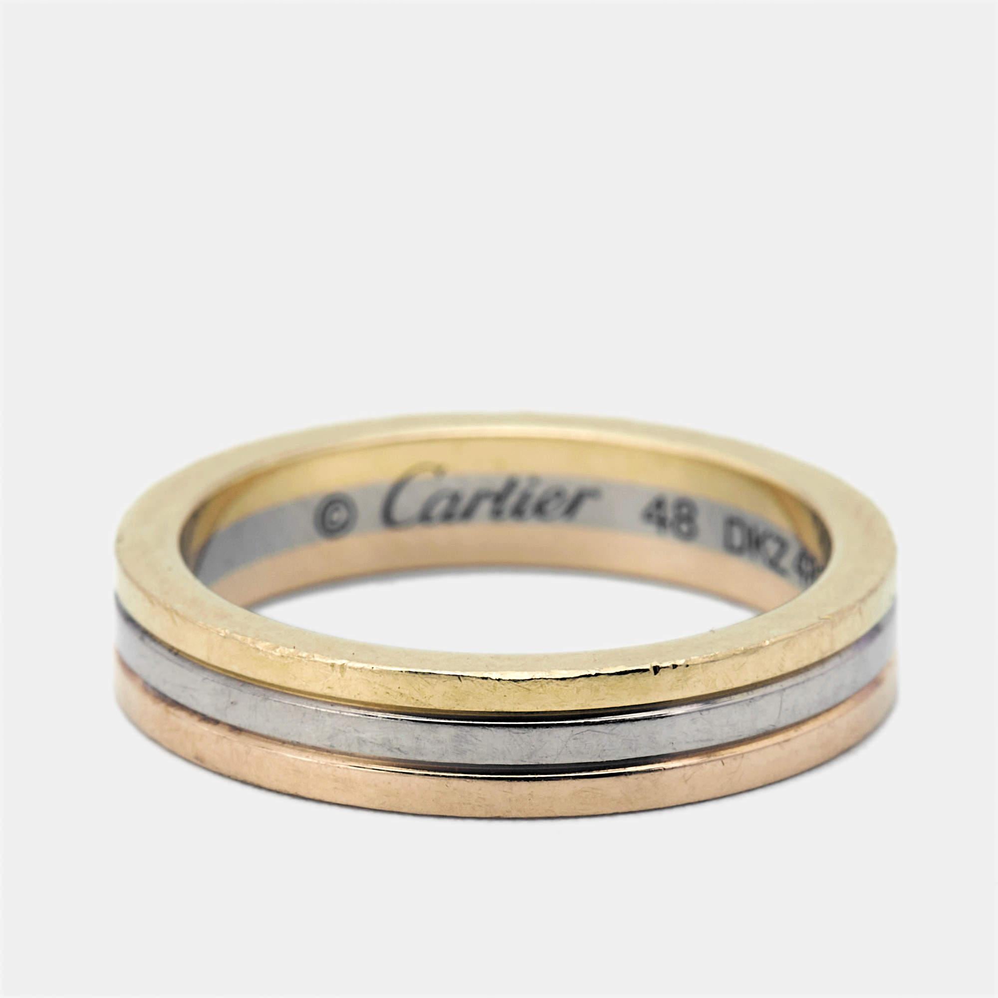 The Cartier Vendome Louis Wedding Band Ring is a masterpiece of luxury. Featuring an exquisite blend of yellow white and rose 18k gold it showcases Cartiers renowned craftsmanship. This rings harmonious design and premium materials make it a