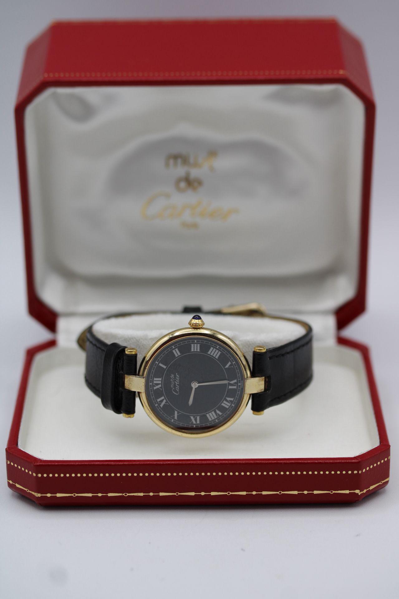 Cartier Vendome Vermeil Must 590003 – Vintage Luxury Timepiece

An elegant and rare vintage timepiece, the Cartier Vendome Vermeil Must de Cartier 590003 is a stunning example of timeless design and reliable performance. Recently serviced and in