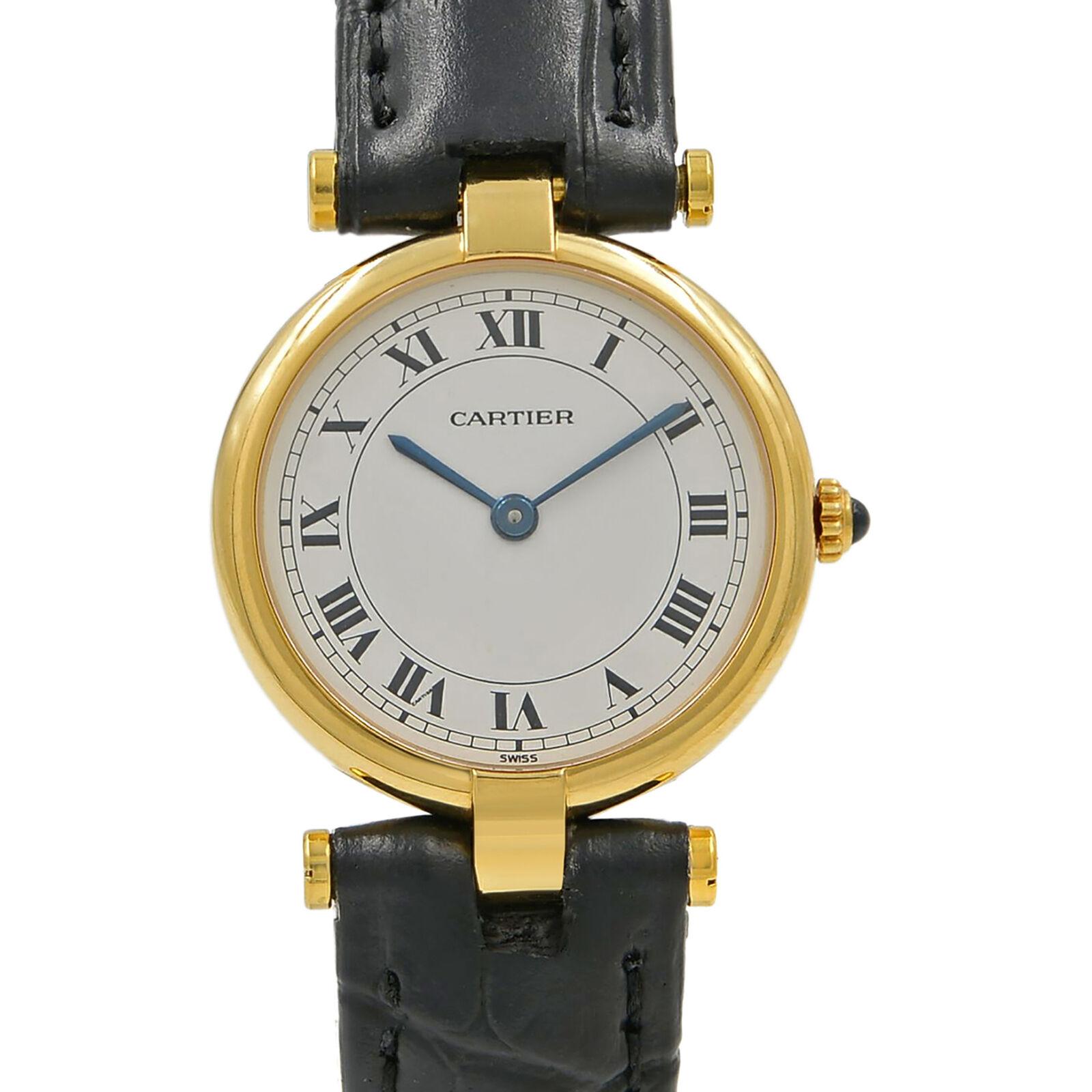 This pre-owned Cartier Vendome 881002 is a beautiful Ladies timepiece that is powered by a quartz movement which is cased in a yellow gold case. It has a round shape face, no features dial and has hand roman numerals style markers. It is completed