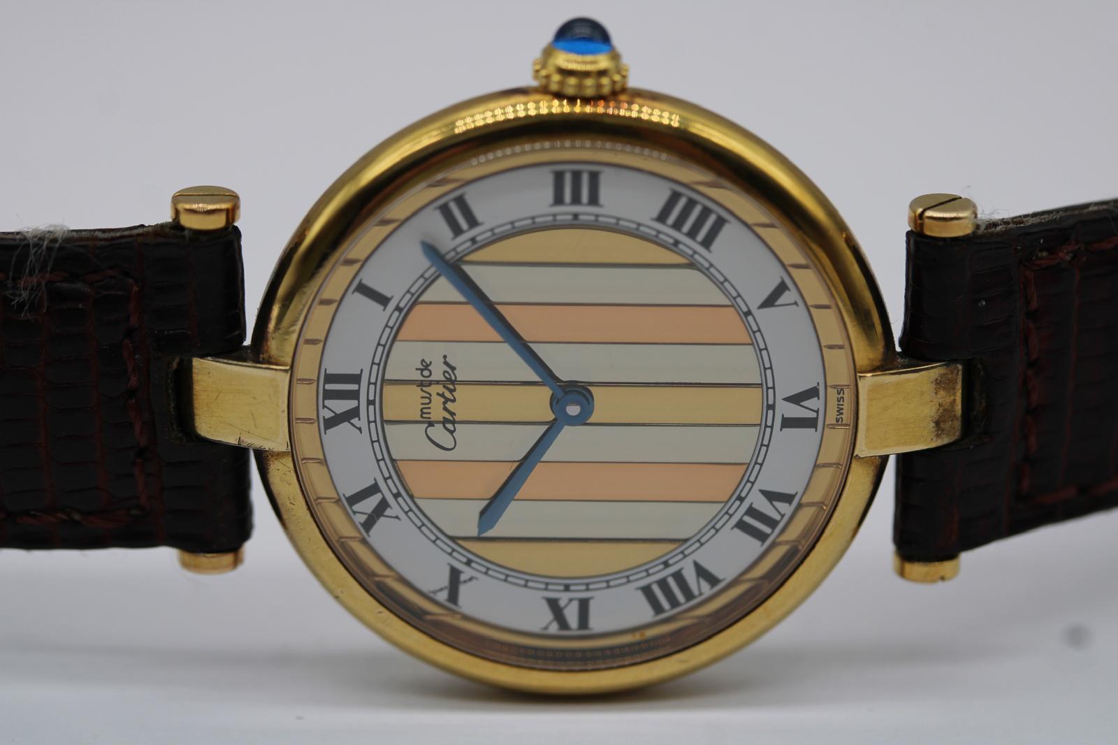Watch: Cartier Vermeil Must 590003
Stock Number: CHW6423

Cartier Must de Cartier – Ref. 590003 – Trinity Style Dial – 30mm

An exceptional example of the Cartier Must de Cartier 590003, this vintage model presents in 8.5/10 condition with minimal