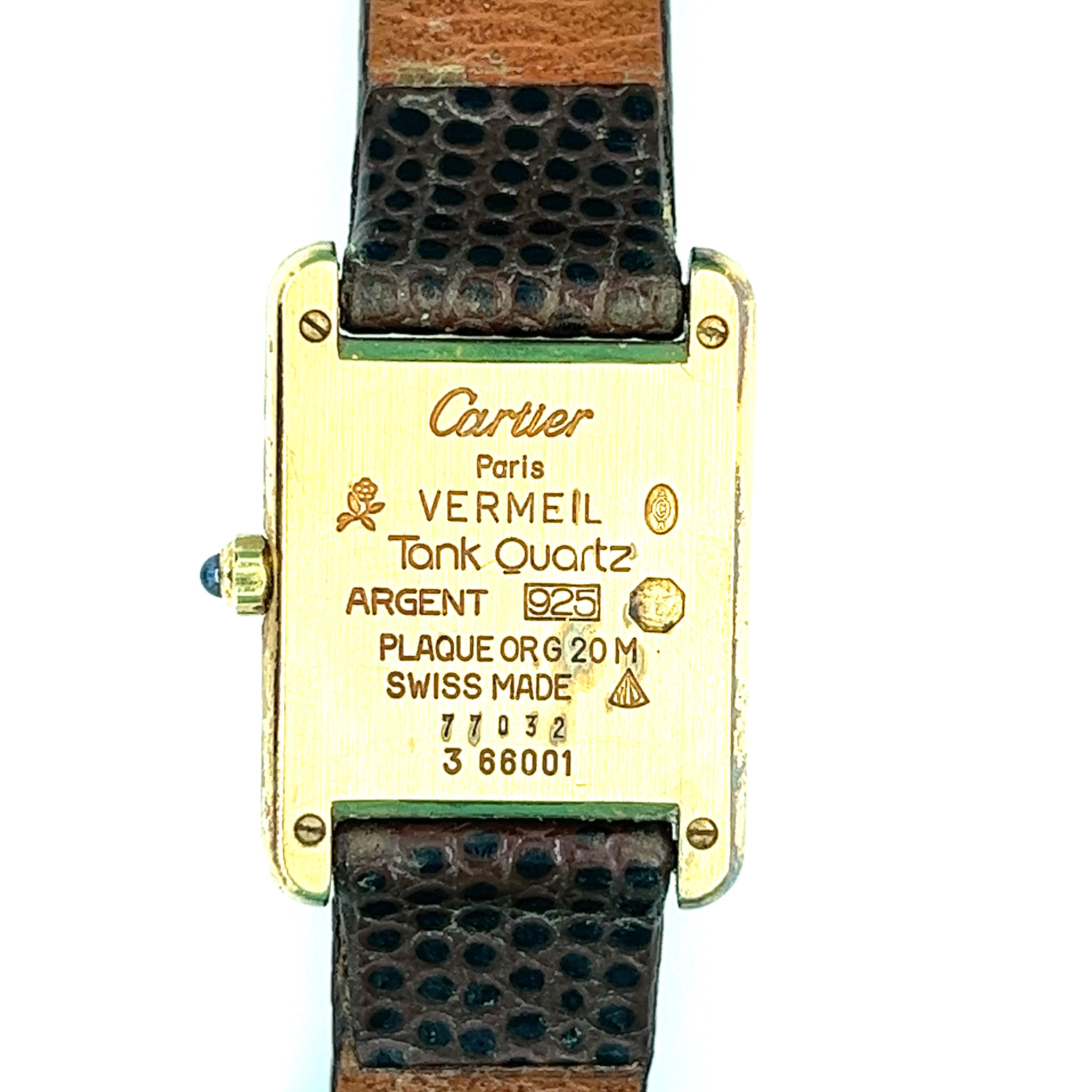 Vintage Cartier Tank 24mm gold vermeil with quartz movement. Features black dial, no numerals, screw down crown.

- Brand: Cartier
- Model: Tank
- Bracelet Material: Leather (replacement)
- Year of production: 1986 (Approximation)
- Condition: