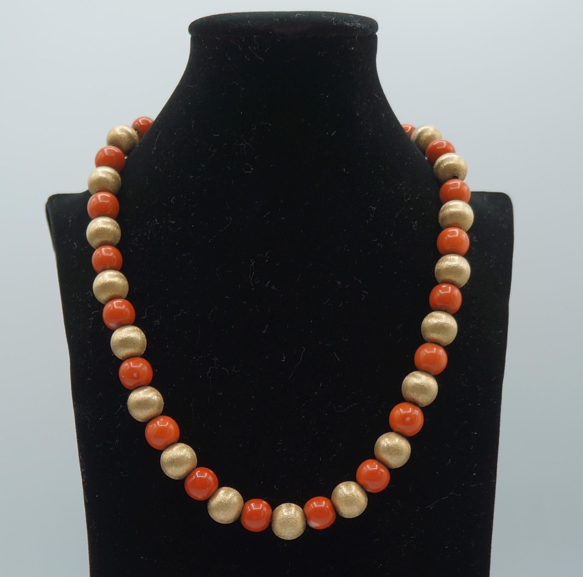 Cartier Vintage 14kt Gold Mediterranean Coral Bead Necklace 

Comprised of 22, 10mm Textured Gold Beads and 21, Red Mediterranean Coral Beads 

Measures 15.5 Inches / 39.5cm

Hallmarks: 
