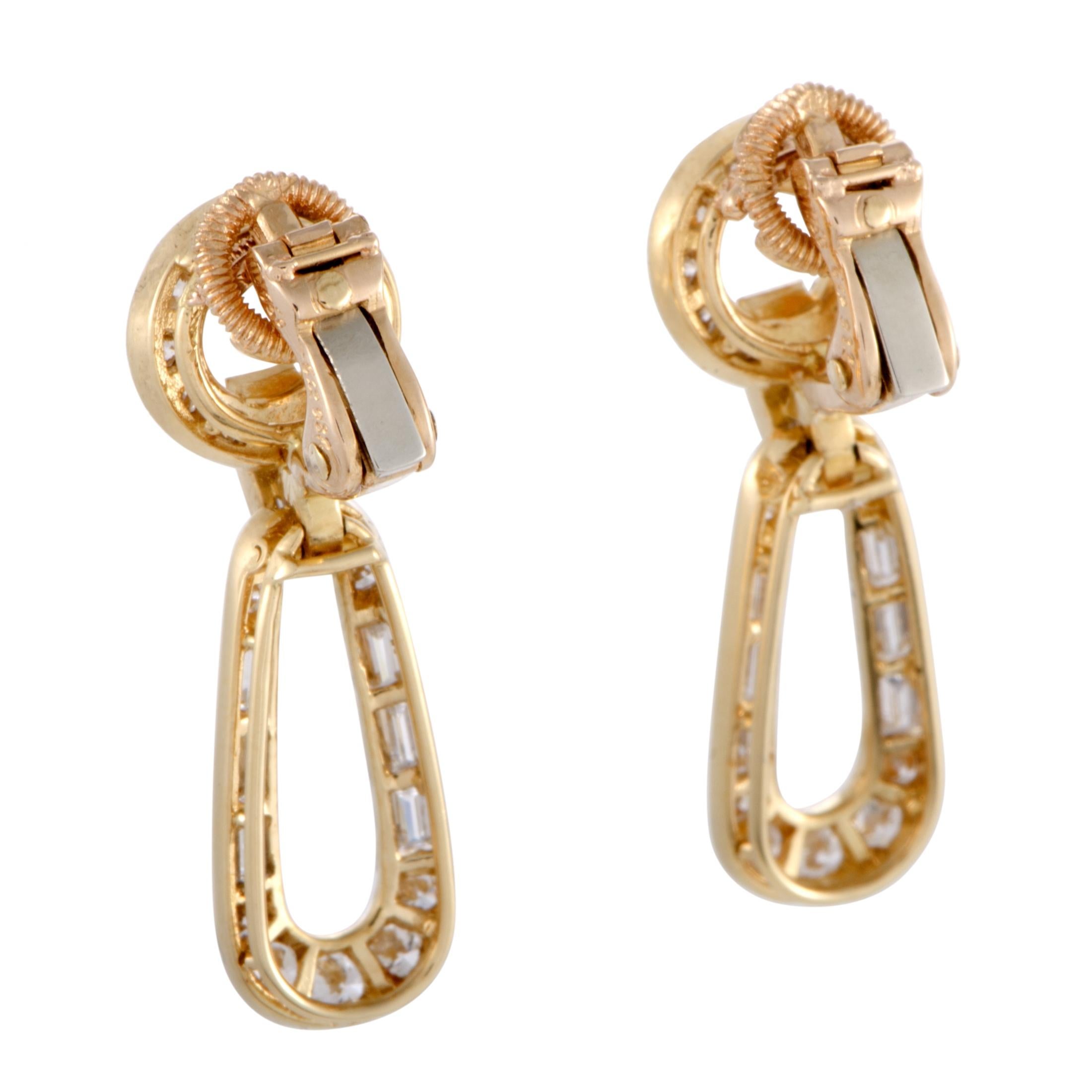 Exuding irresistible excellence and exuberant prestige to perfectly fit the brand’s timeless style of classic refinement and unrivaled quality, these stylishly exuberant earrings from Cartier are a rare vintage design presented in 18K yellow gold