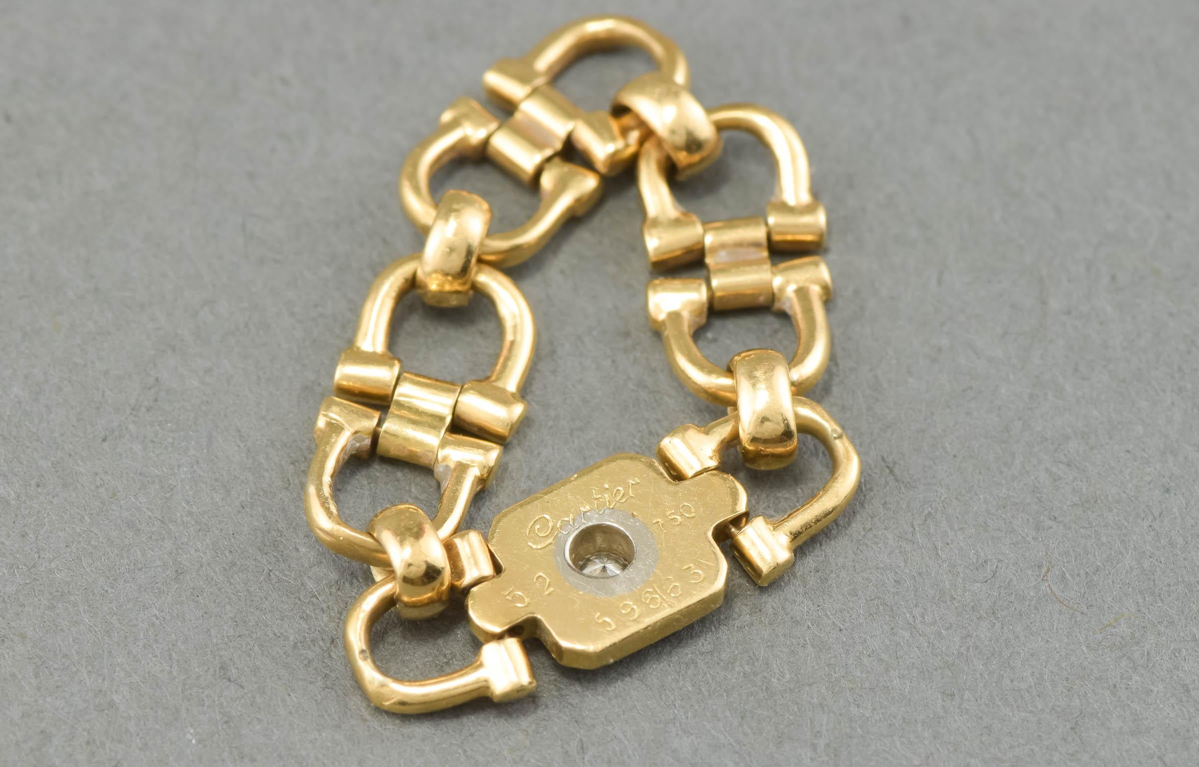 Women's or Men's Cartier Vintage 18k Gold Equestrian Diamond Horse Bit Link Ring, circa 1980s