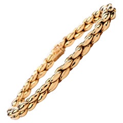 Cartier - Bracelet ovale vintage en or 18 carats avec perles de verre