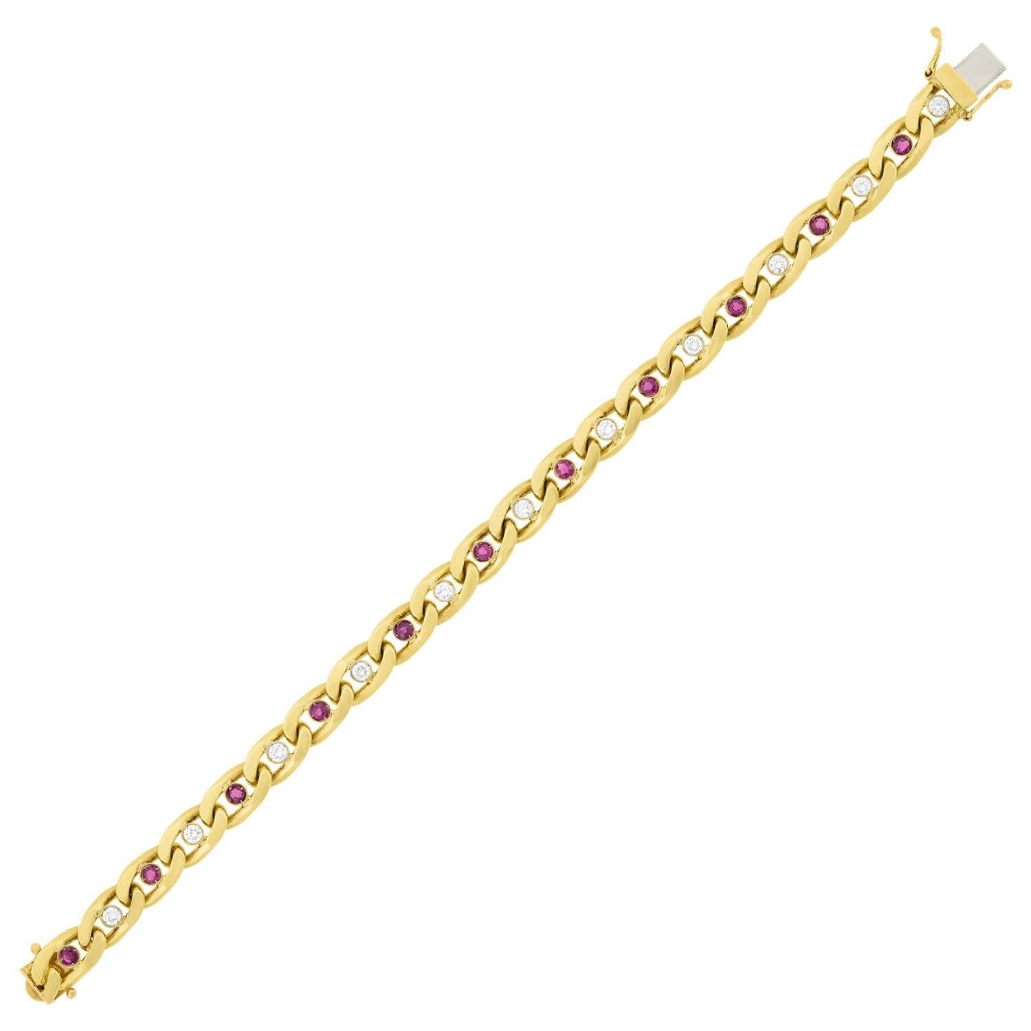 A fantastic Vintage (ca1960s) Cuban link chain bracelet with a very stylish look made by the famed maker Cartier! Made of vibrant 18kt yellow gold and platinum, this amazing piece is comprised of filed oval-shaped links that form a classic Cuban