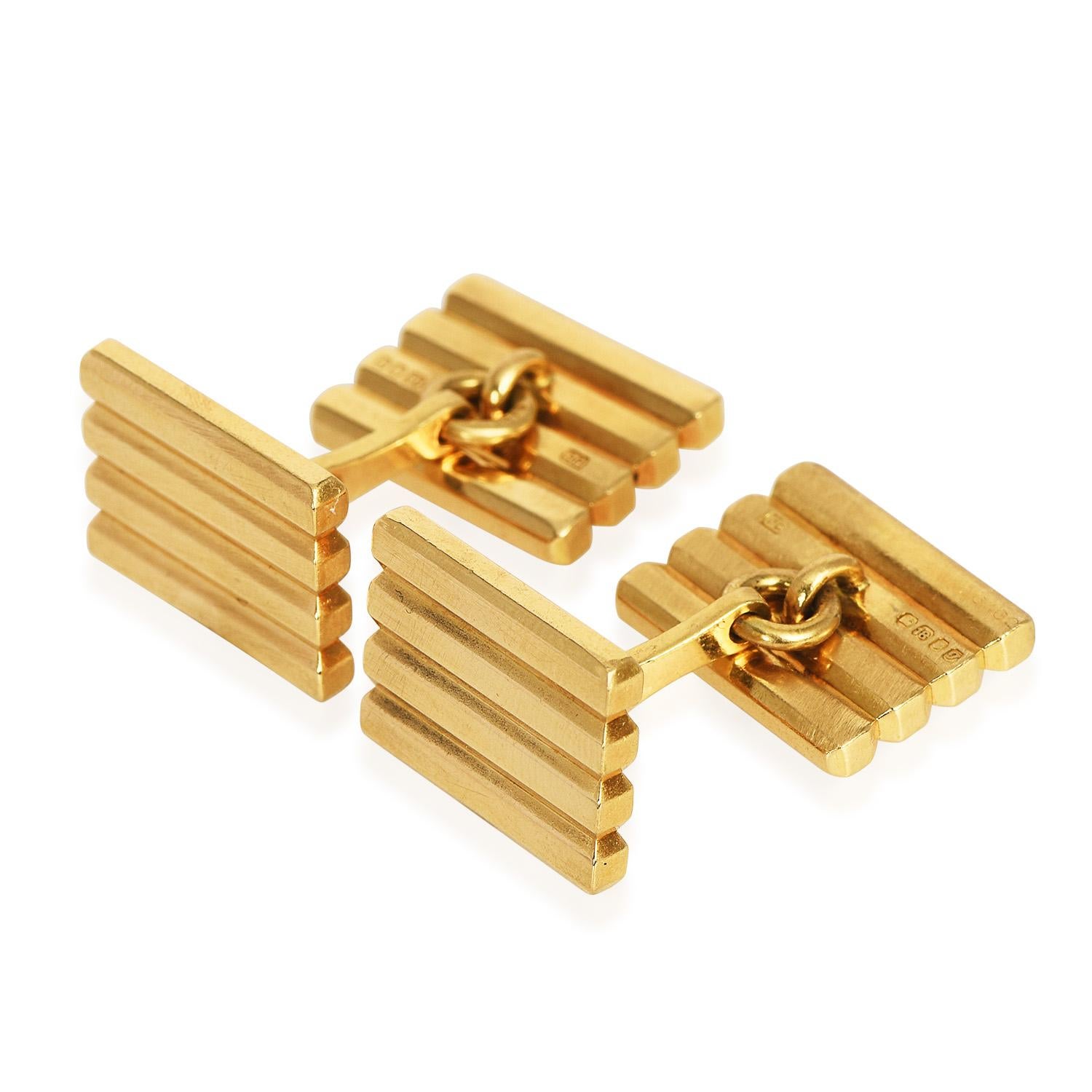 Rise above the rest at your next cocktail occasion with these vintage late 1970s  Cartier 18K Gold Tuxedo Cufflinks. High-polished finish, on a rectangular four-bar style. 
Weight: 25.8 Grams
Cufflinks measure:15 mm x 12 mm
Remains in Excellent