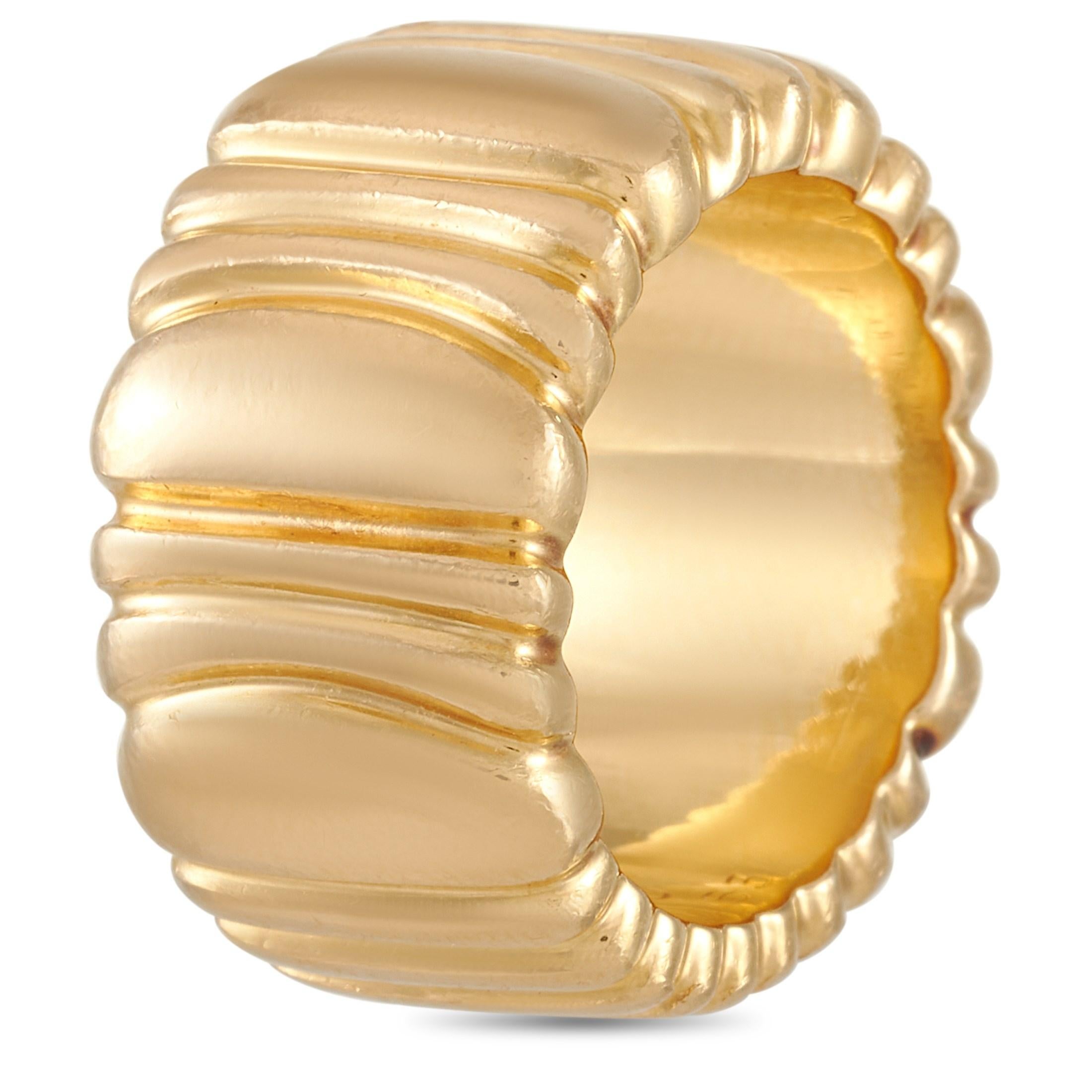 This bold Cartier Vintage 18K Yellow Gold Hammer Finish Band Ring is perfect for the woman who likes to stand out. The band is made with 18K yellow gold and features a hammer finish, creating unique sections of various thicknesses all around the