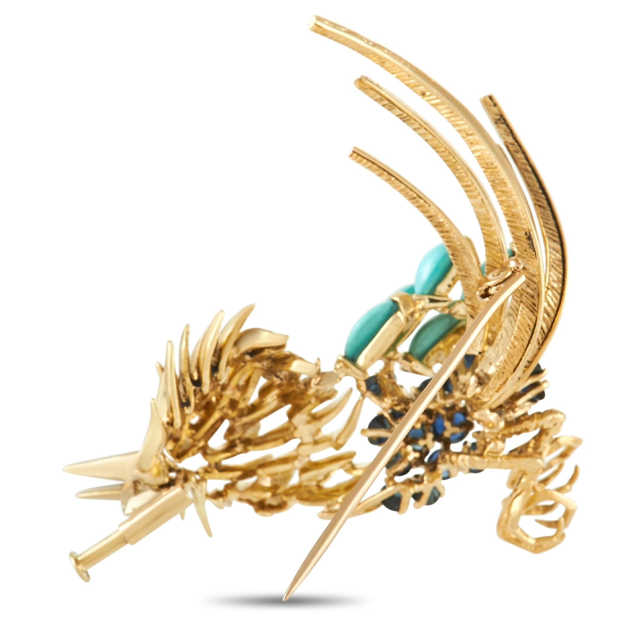 Bold, elegant, and slightly abstract, this bird brooch from luxury brand Cartier will elevate any jewelry collection. Crafted from 18K Yellow Gold, this piece measures 2” long and 2” wide. It’s also accented by colorful Sapphire, Turquoise, and Ruby