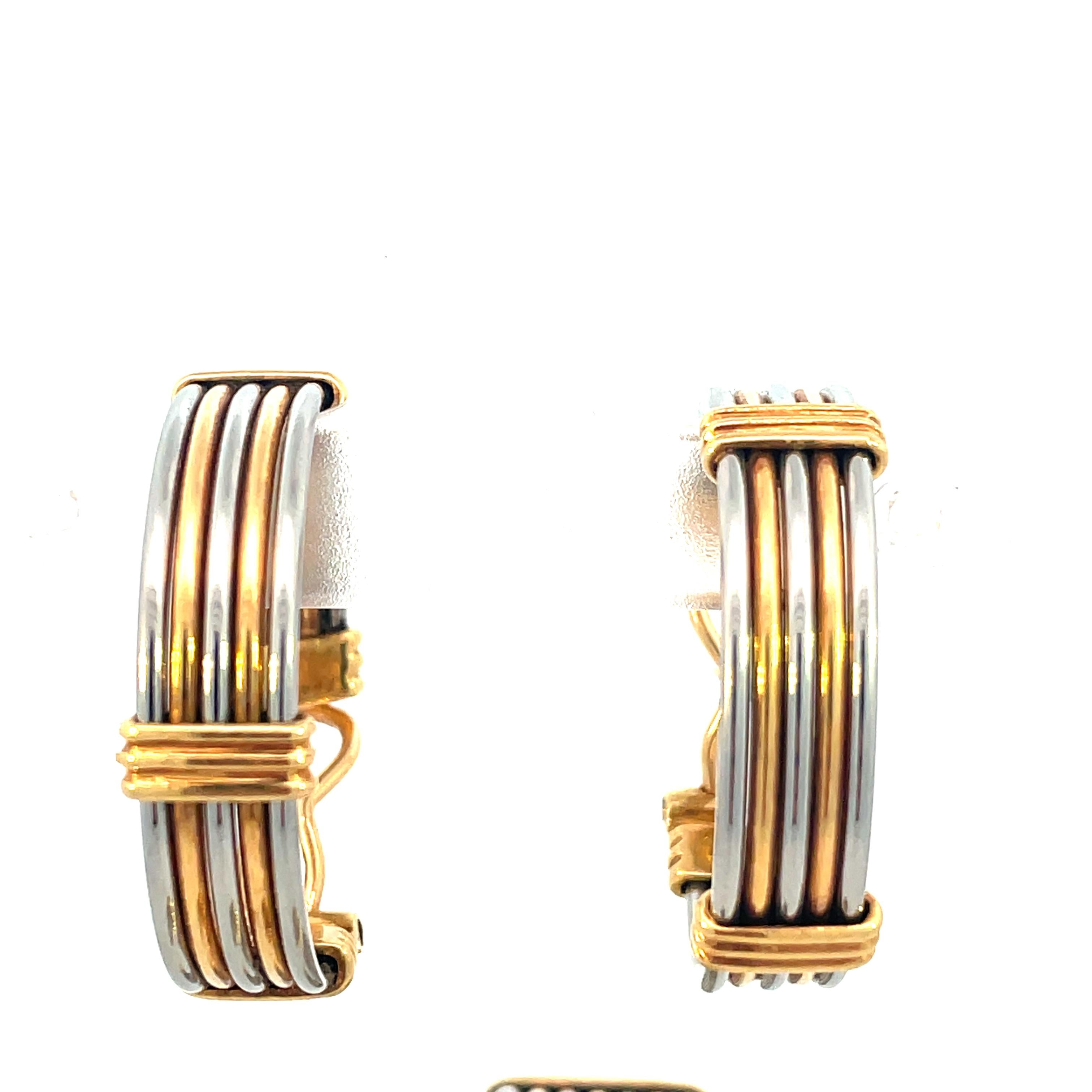 Embrace timeless elegance with this exquisite vintage steel and gold jewelry set from Cartier. Crafted with precision and attention to detail, these stunning Cartier earrings and bracelet exude a sense of sophistication and charm that transcends