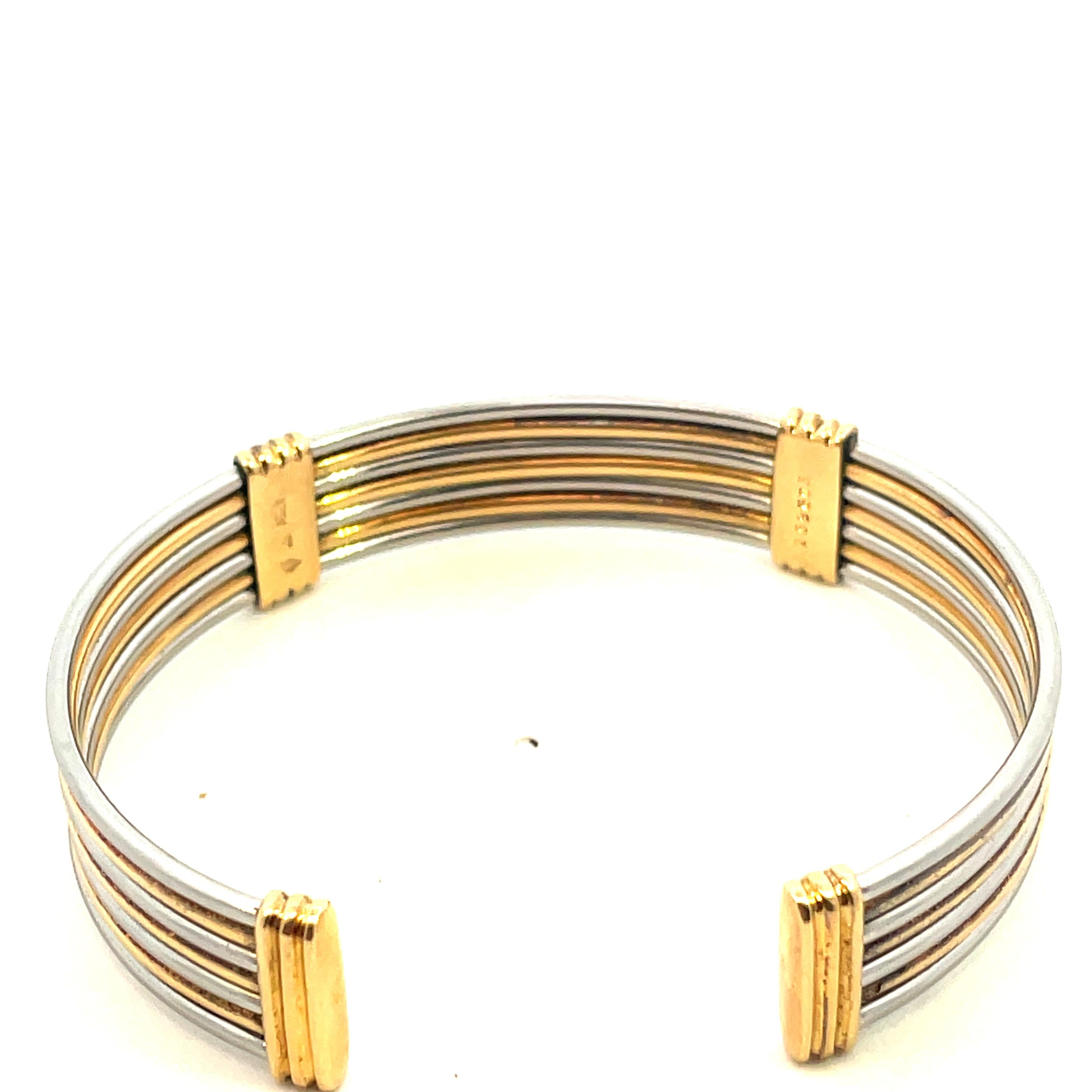 Women's or Men's Cartier Vintage 18kt Gold Stainless Steel Bangle Bracelet For Sale