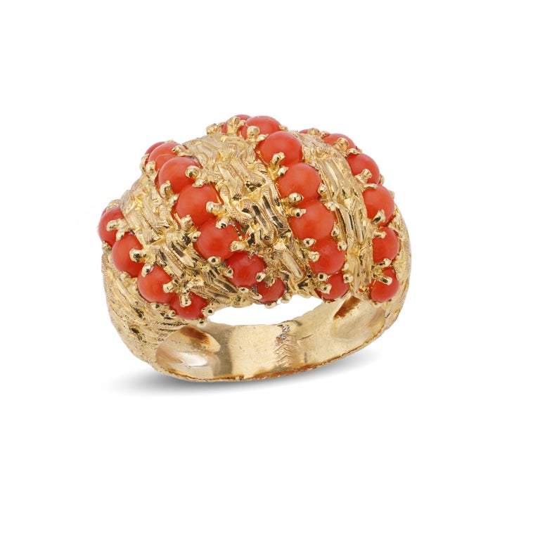 Cartier Vintage 18kt. yellow gold and coral Signori and Bondioli ring.
Hallmarked for Cartier, 750 mark, with the master mark of Signori & Bondioli, 
the predecessors of Pomellato in Milan, 1967-1968.

The Dimensions:
Finger's size (UK) = N (US) = 7
