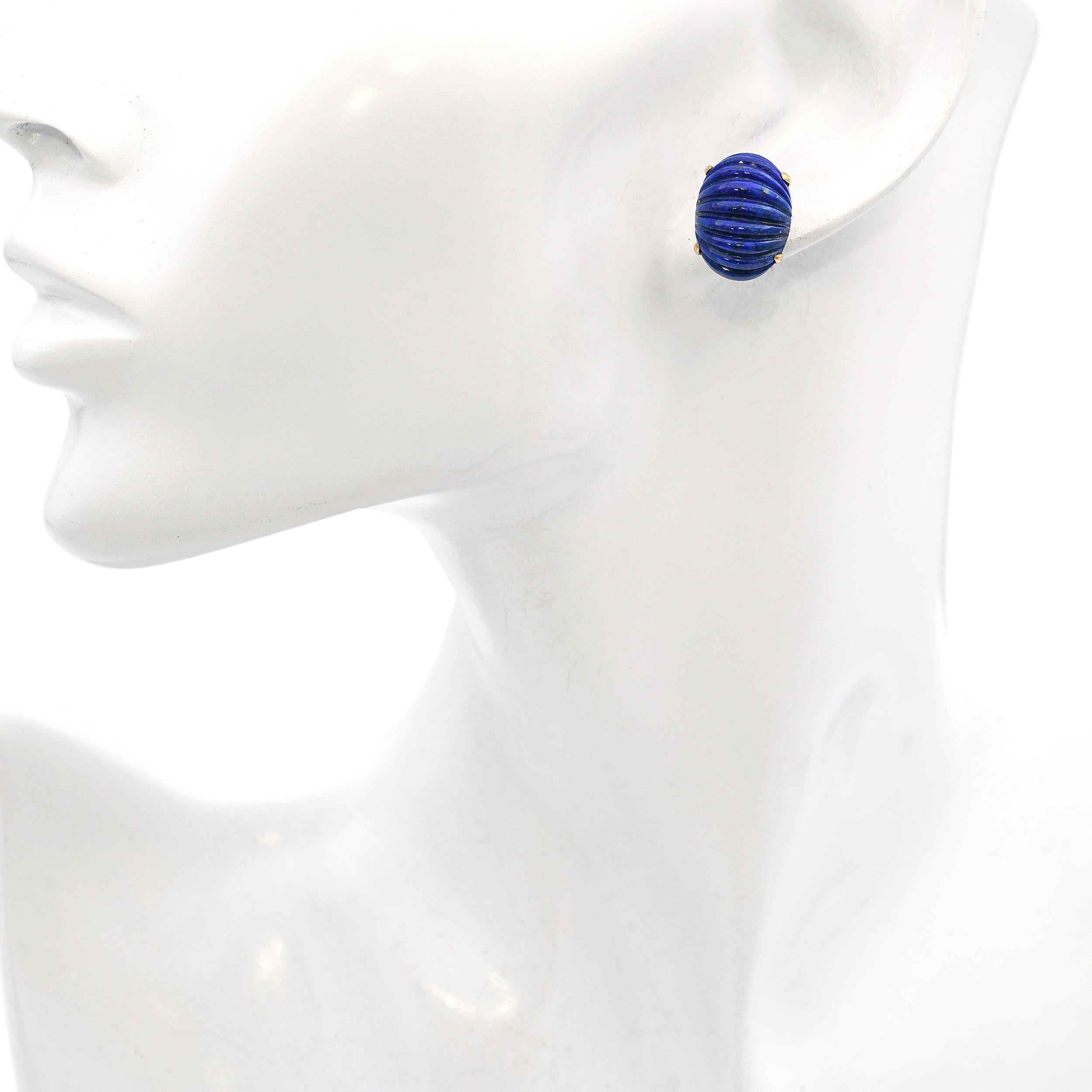 Cartier Vintage Earrings featuring richly hued, carved lapis lazuli stones set in warm 14K yellow gold. These mid-century pieces reflect Cartier’s signature craftsmanship, blending vibrant color with graceful form. A rare and enduring design from a