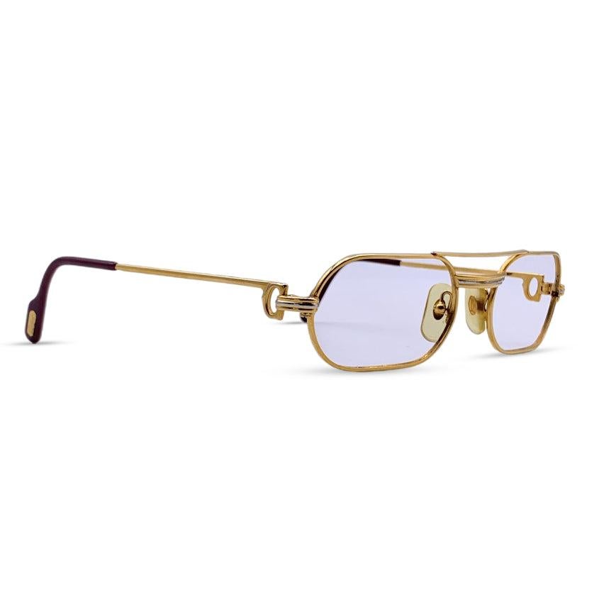 Vintage rare CARTIER Pariseyeglasses frame. They feature the Louis Cartier decor. Very rare Sunglasses from the 80s. The same model was worn by Elton John in the 1983 'I'm still standing' music video. 22K Gold plated frame. No lenses. They will come