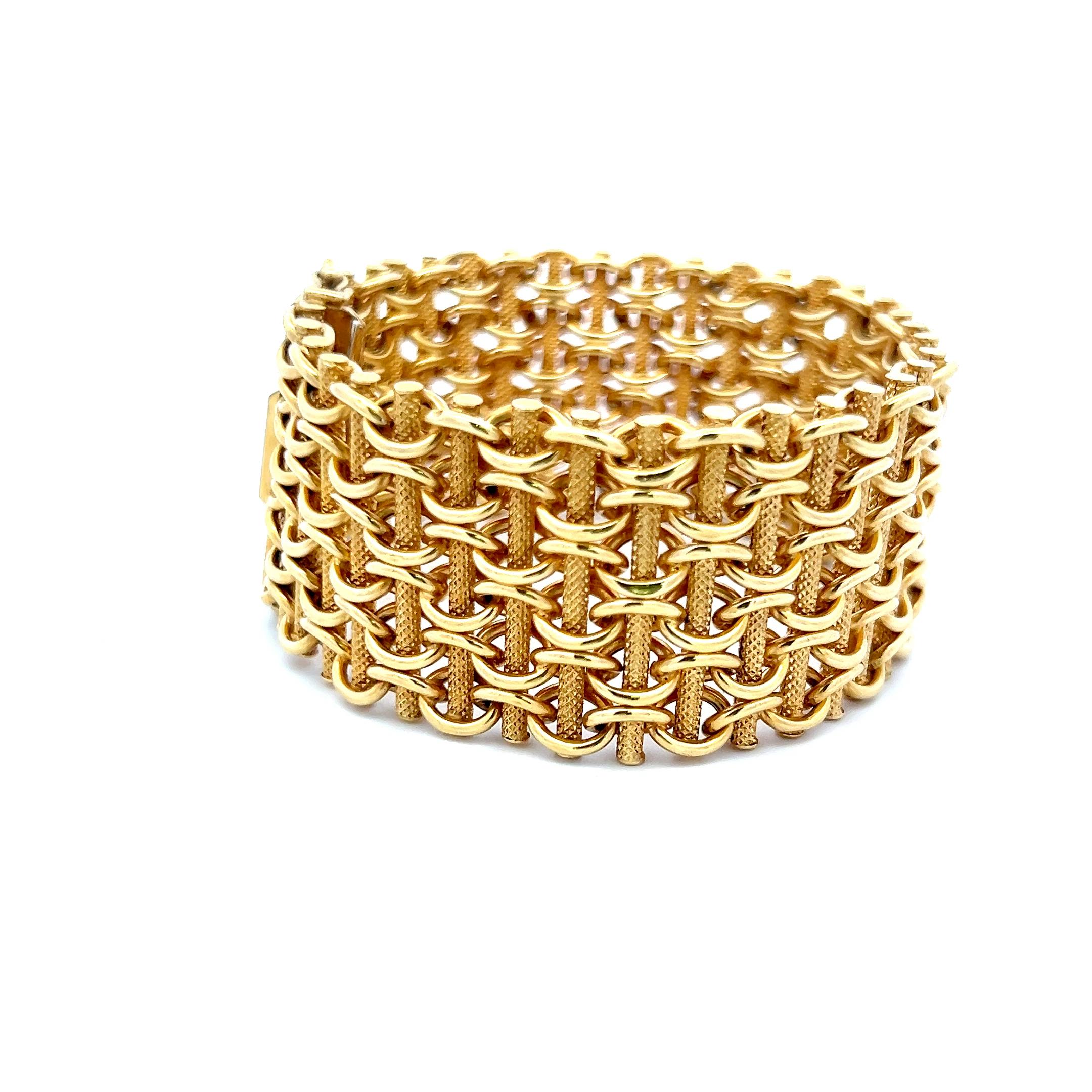 Designer:
CARTIER
Title:
Cartier 18 Karat Yellow Gold Bracelet
Metal:
18 Karat Yellow Gold
Dimension:
7*1.06*0.17in
Weight:
44.8 Grams
Condition:
Vintage And Estate
Product ID:
5J578
Note:
Please note that all the non-GIA Gemstones' Weight, Color,