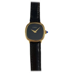 Cartier Montre vintage à remontage manuel en onyx noir avec cadran