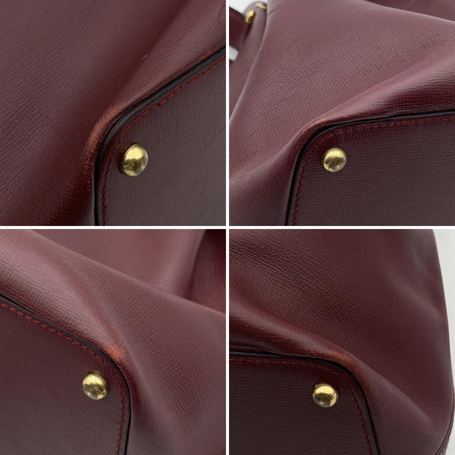 Women's Cartier Vintage Burgundy Leather Drawstring Bucket Shoulder Bag