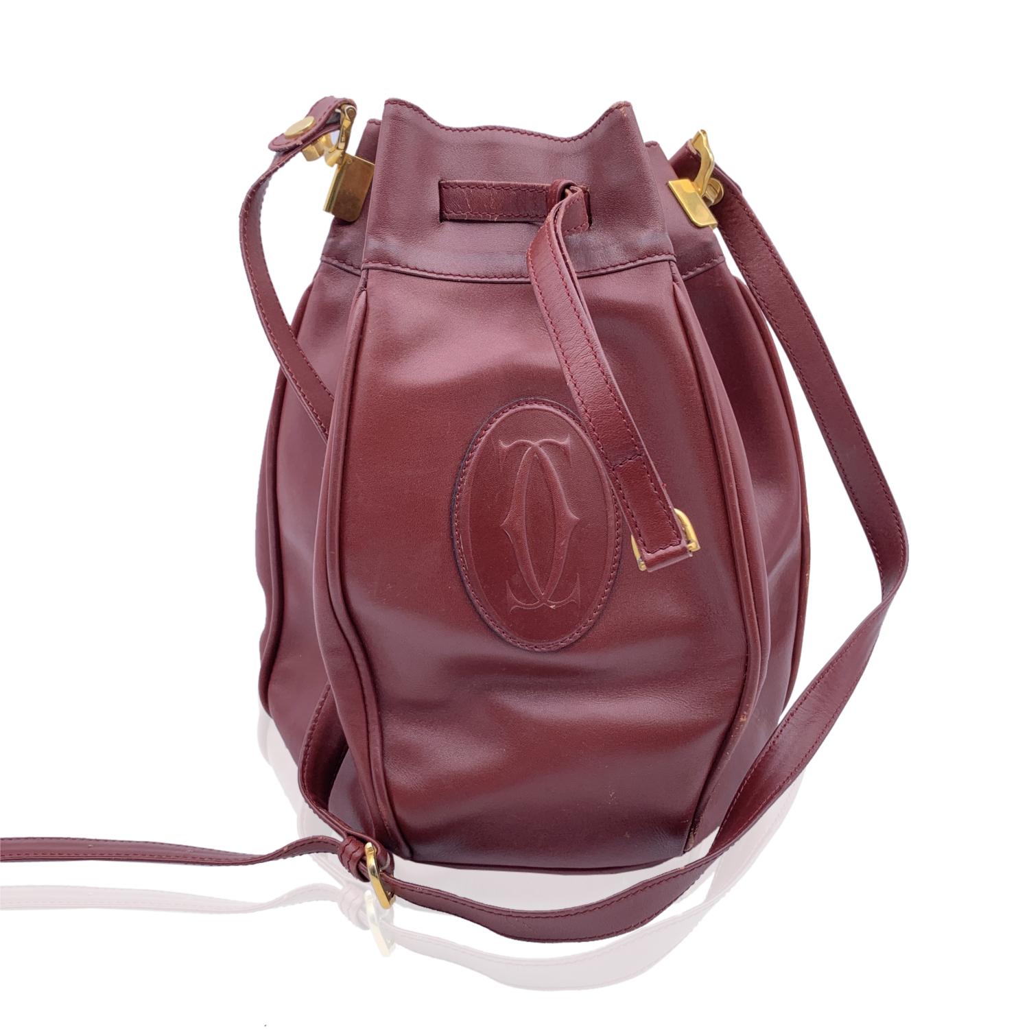 Cartier Vintage Burgundy Leather Drawstring Bucket Shoulder Bag In Good Condition In Rome, Rome