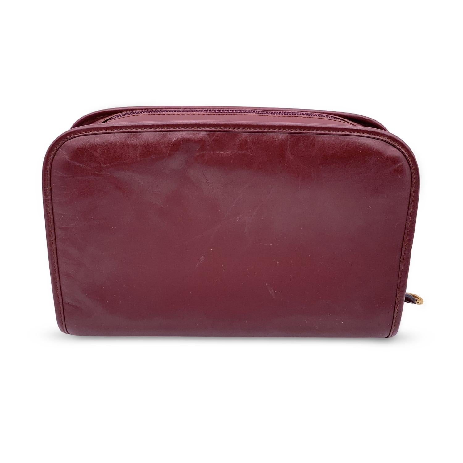Cartier Vintage Burgundy Leather Pochette Cosmetic Bag In Good Condition In Rome, Rome