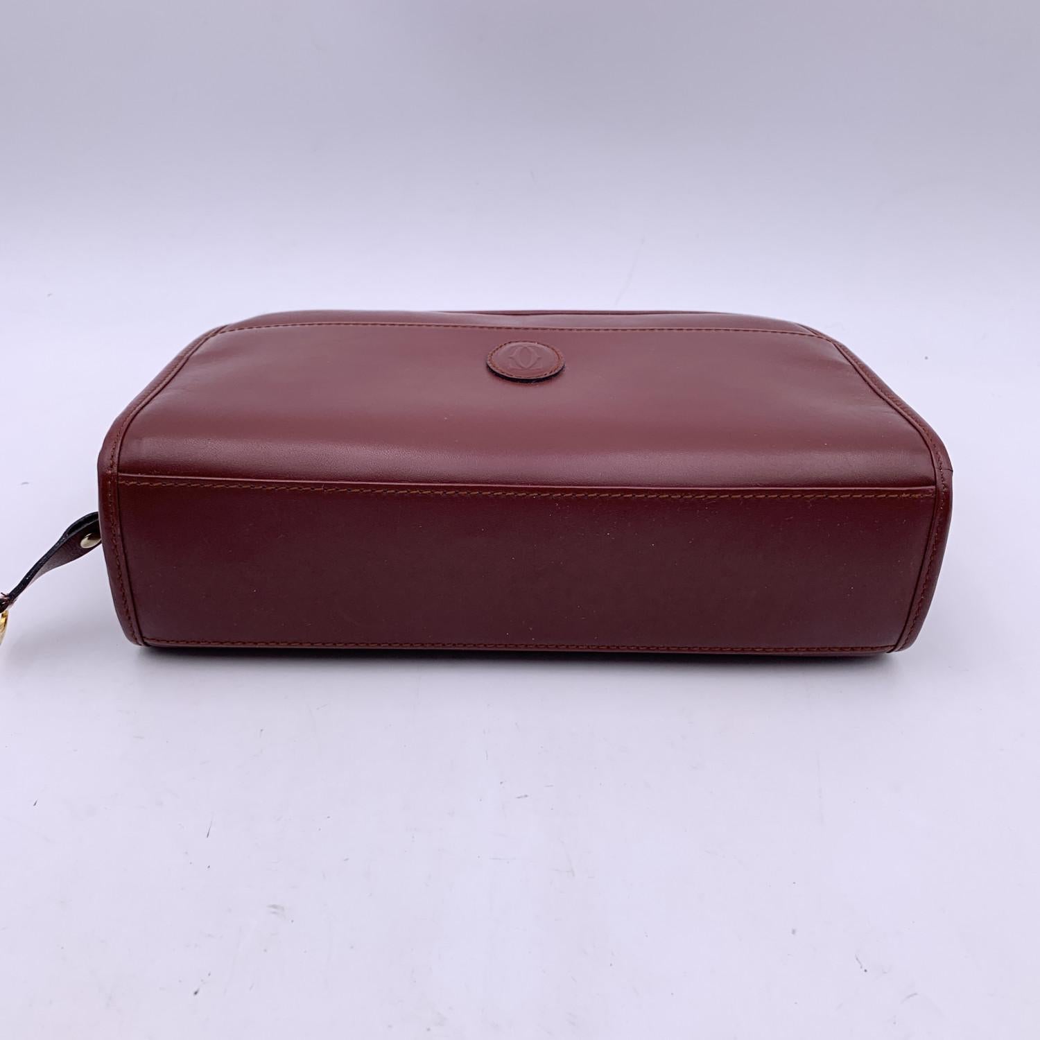 Women's Cartier Vintage Burgundy Leather Pochette Cosmetic Bag
