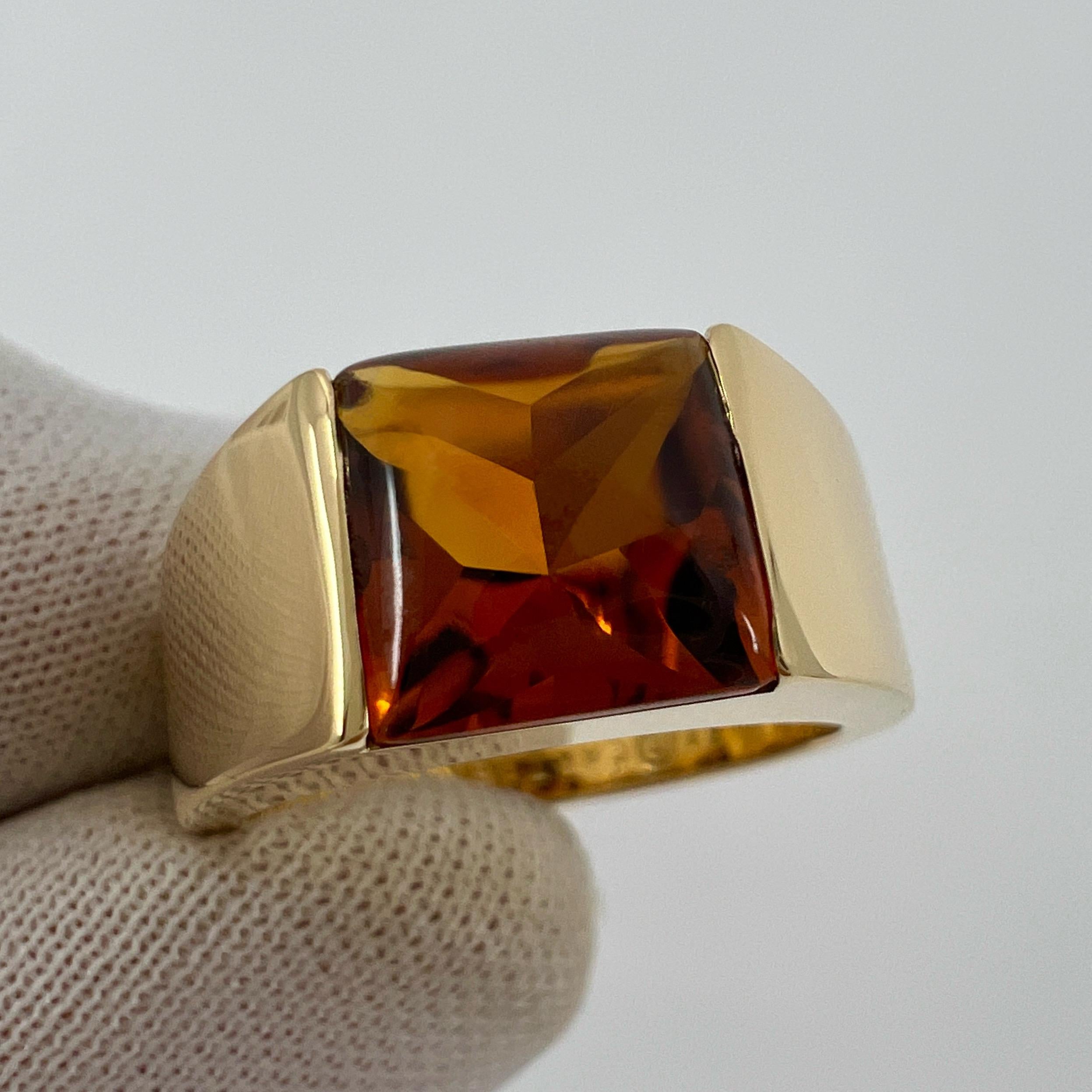 Vintage Cartier Deep Orange Citrine 18k Yellow Gold Tank Band Ring.

Stunning yellow gold ring with an 8mm tension set deep orange citrine. Fine jewellery houses like Cartier only use the finest of gemstones and this citrine is no exception. A top