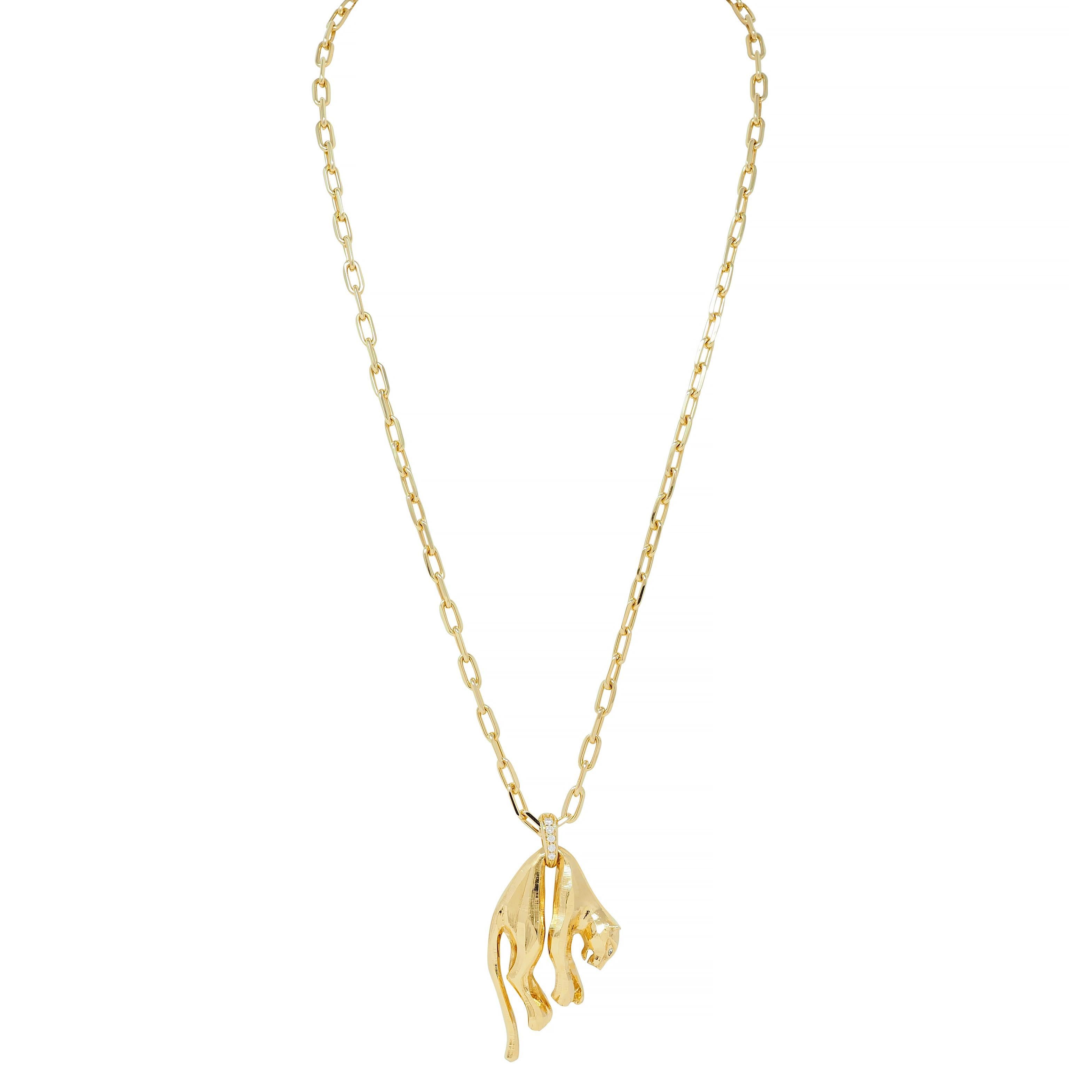 Comprised of paperclip link chain suspending a stylized panther pendant
Depicted hanging from midsection and draped over looped bale 
Designed with faceted surface and subtle linear texture
Bale features graduated round brilliant cut diamonds
With