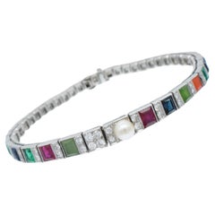 CARTIER Bracelet Vintage en diamant, pierres précieuses et perles en platine.