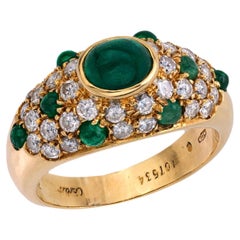 Anello Cartier vintage con smeraldo e diamante in oro giallo 18 carati