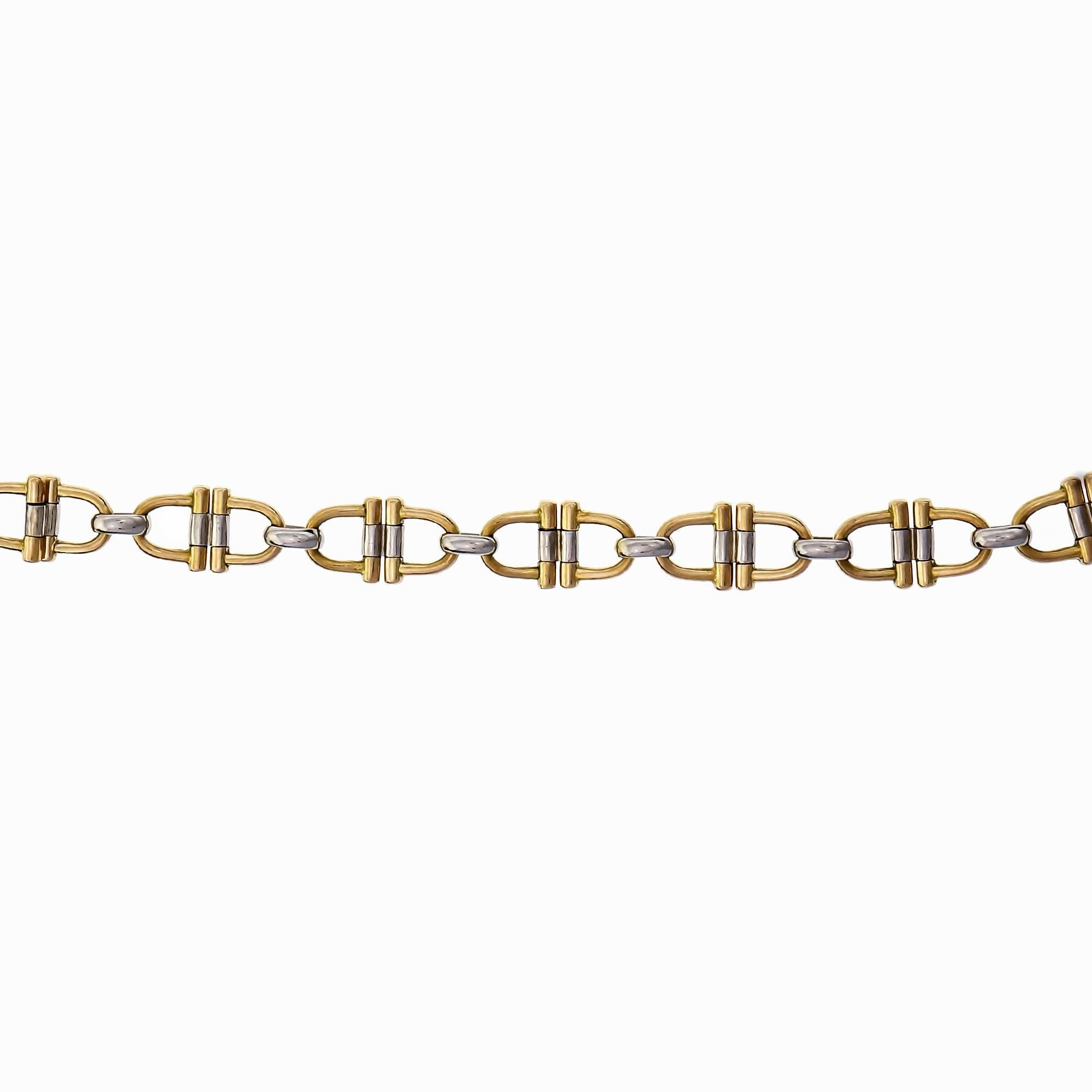 Cartier Equestrian theme 18k white and yellow gold 18-inch neck chain. Hinged links.

18k white and yellow gold
Length: 18 inches – Width: 7.17mm – Depth: 1.67mm
29.3 grams
Tested: 18k
Stamped: 750
Hallmark: Cartier 709308



