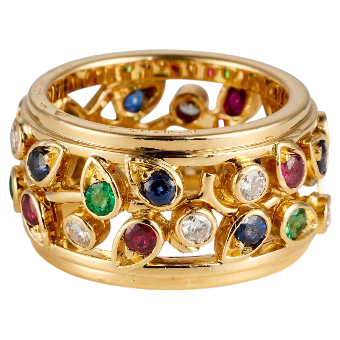 CARTIER Vintage-Ring mit Blumenmotiv, 18 Karat Gelbgold mit Smaragden und Saphiren