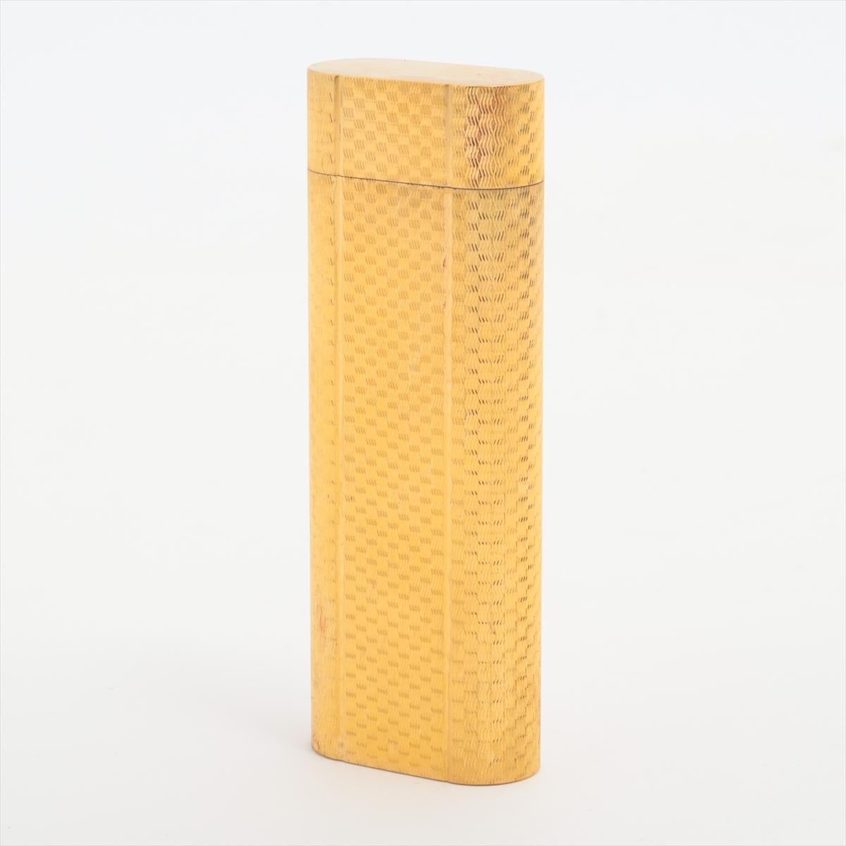 The Cartier Vintage Gold-Plate Lighter is a luxurious and timeless accessory, embodying the elegance and craftsmanship that Cartier is renowned for. Crafted with a gold-plated finish, the lighter exudes a refined and sophisticated appeal. Its