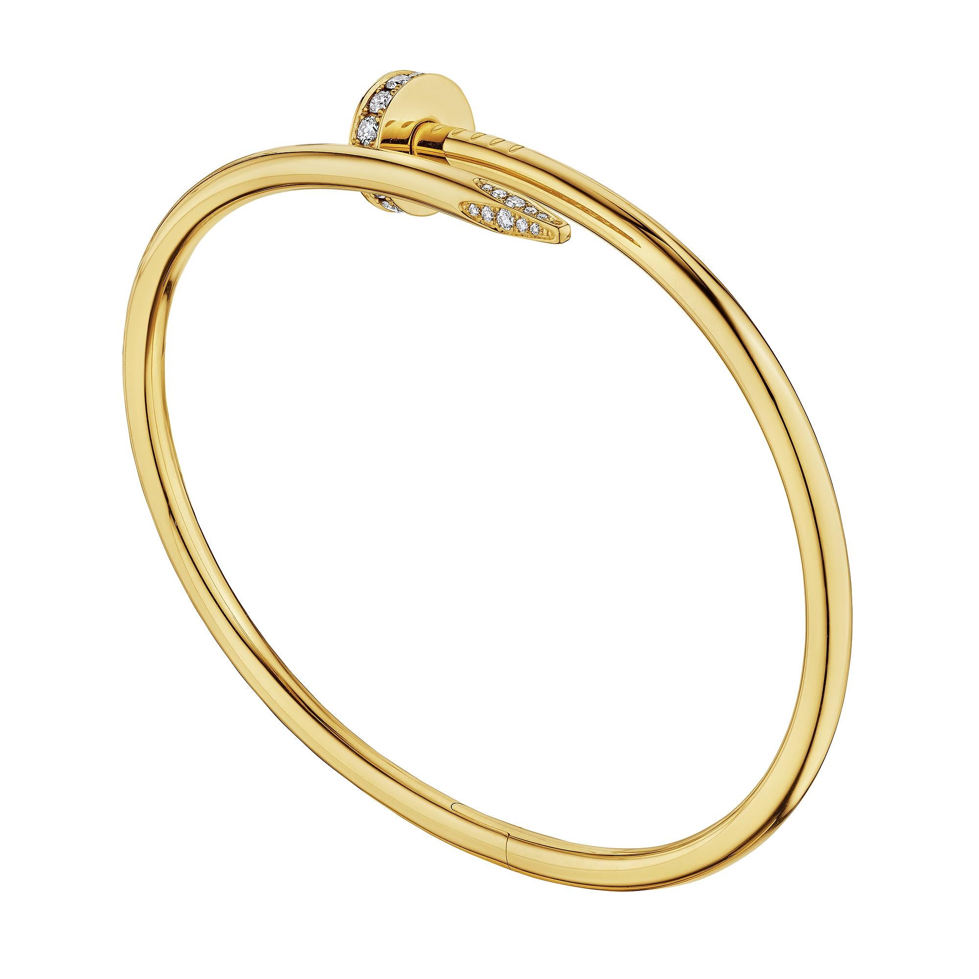 Nail it shut with this Cartier modernist 'Juste Un Clou' diamond gold nail shape bracelet.  With 32 round brilliant cut diamonds, this iconic 18 karat yellow gold bracelet will pin down your wardrobe's high style.  Signed Cartier.  Stamped with