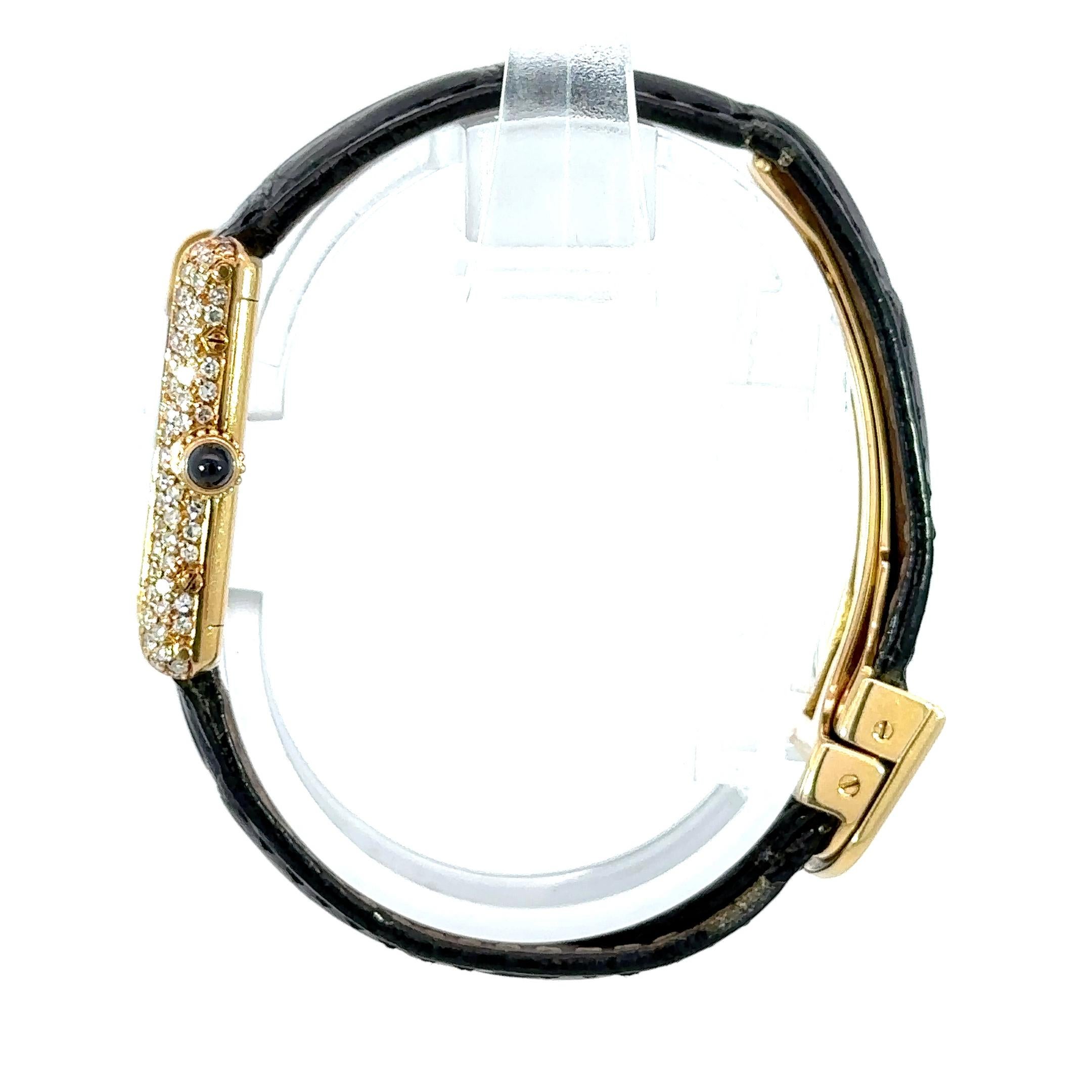 Cartier Small Vintage Louis Tank 18K Yellow Gold 
Lunette à trois rangs de diamants
Mouvement à quartz
Sangle pour reptiles
1970s
Boîtier 21 x 28 mm
