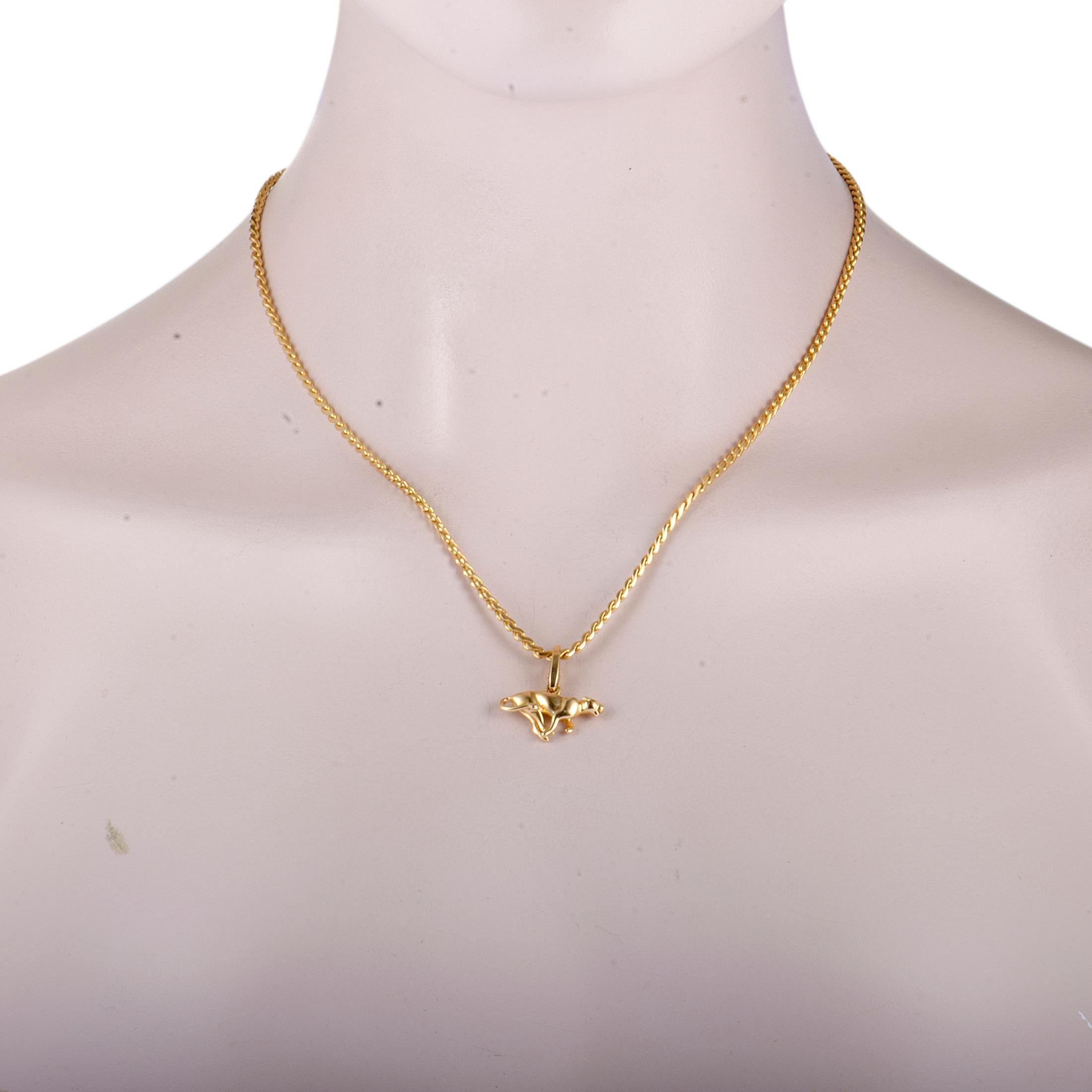This attractive vintage necklace is part of the iconic “Panthère” collection by Cartier and features a beautifully designed chain onto which an eye-catching panther pendant is attached. The necklace is masterfully crafted from luxurious 18K yellow