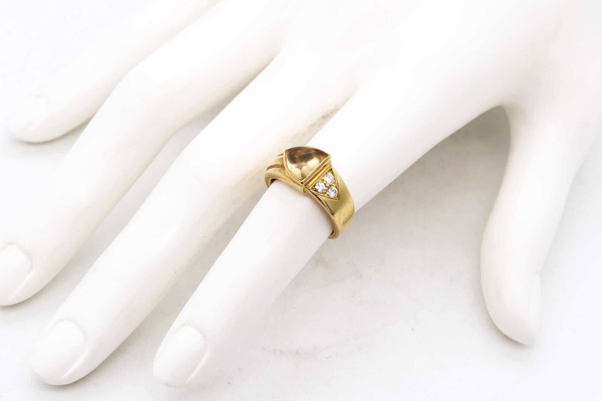 A ring designed by Cartier.

Very cute piece hand crafted in solid 18 karats yellow gold and mounted with gemstones.

Bezel set, with one cabochon trillion cut (7 x 7 x 4 mm) of a natural citrine of 1.60 carats.

Accented with 3 round brilliants
