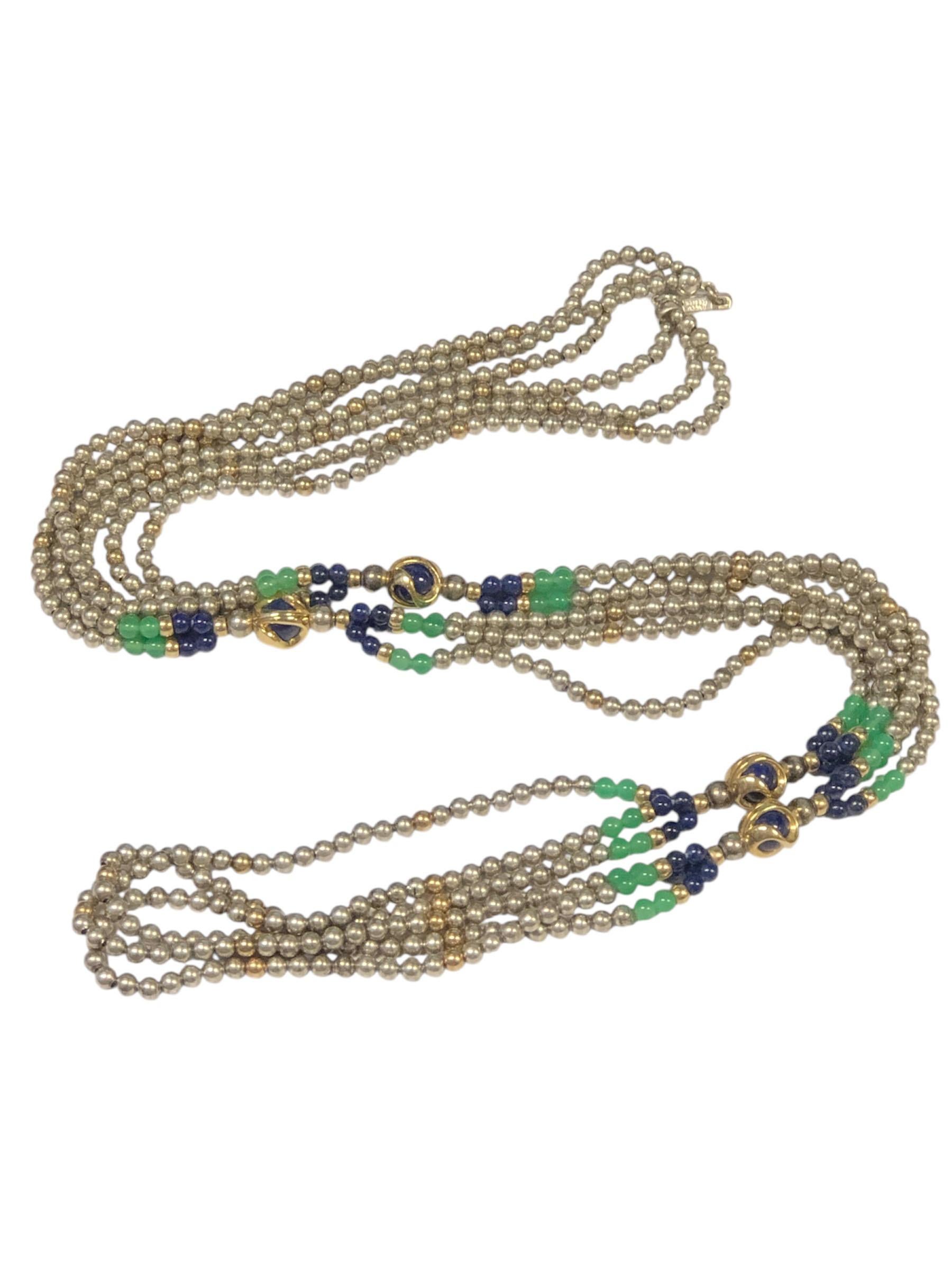 Circa 1960s Cartier Scarce triple strand Opera length Sterling Silver and 18k Yellow Gold 3 M.M Bead necklace, further set with Green Chalcedony and Blue Lapis Lazuli 3 M.M beads. Several Larger Gold covered Lapis sections, necklace length 20