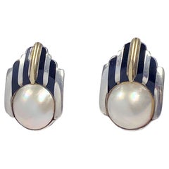 Cartier Boucles d'oreilles vintage en argent, or, émail et perles