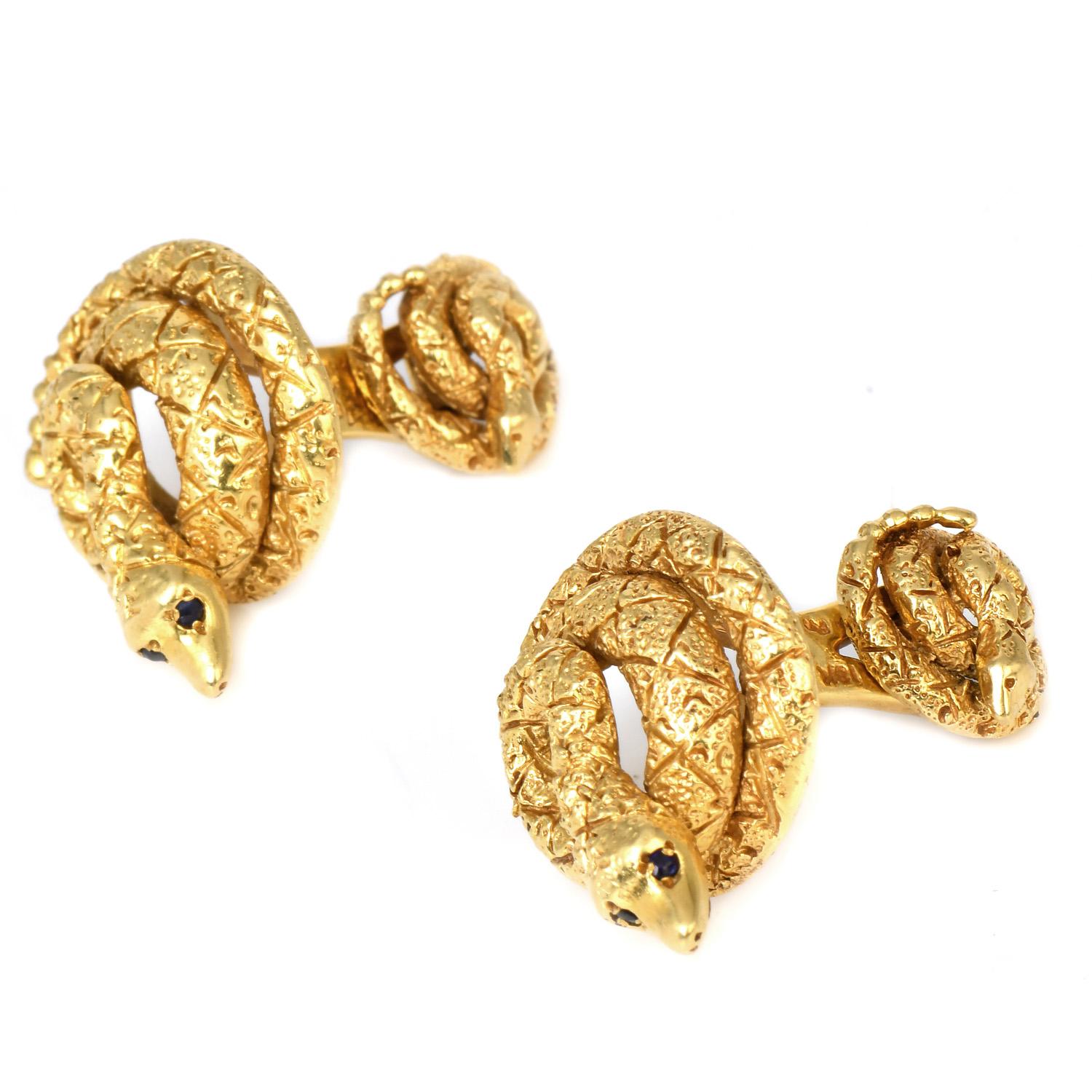 These Handsome Vintage CARTIER cufflinks were inspired in a 

snake motif and crafted in 18K yellow gold.

Weighing approx. 21.9 grams and measuring appx. 22 x 20mm. 

Signed cartier and numbered.

Remain in Excellent Condition.

Accompanied by a