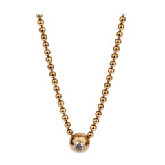 Cartier Retro Solitaire Diamond Gold Pendant Necklace