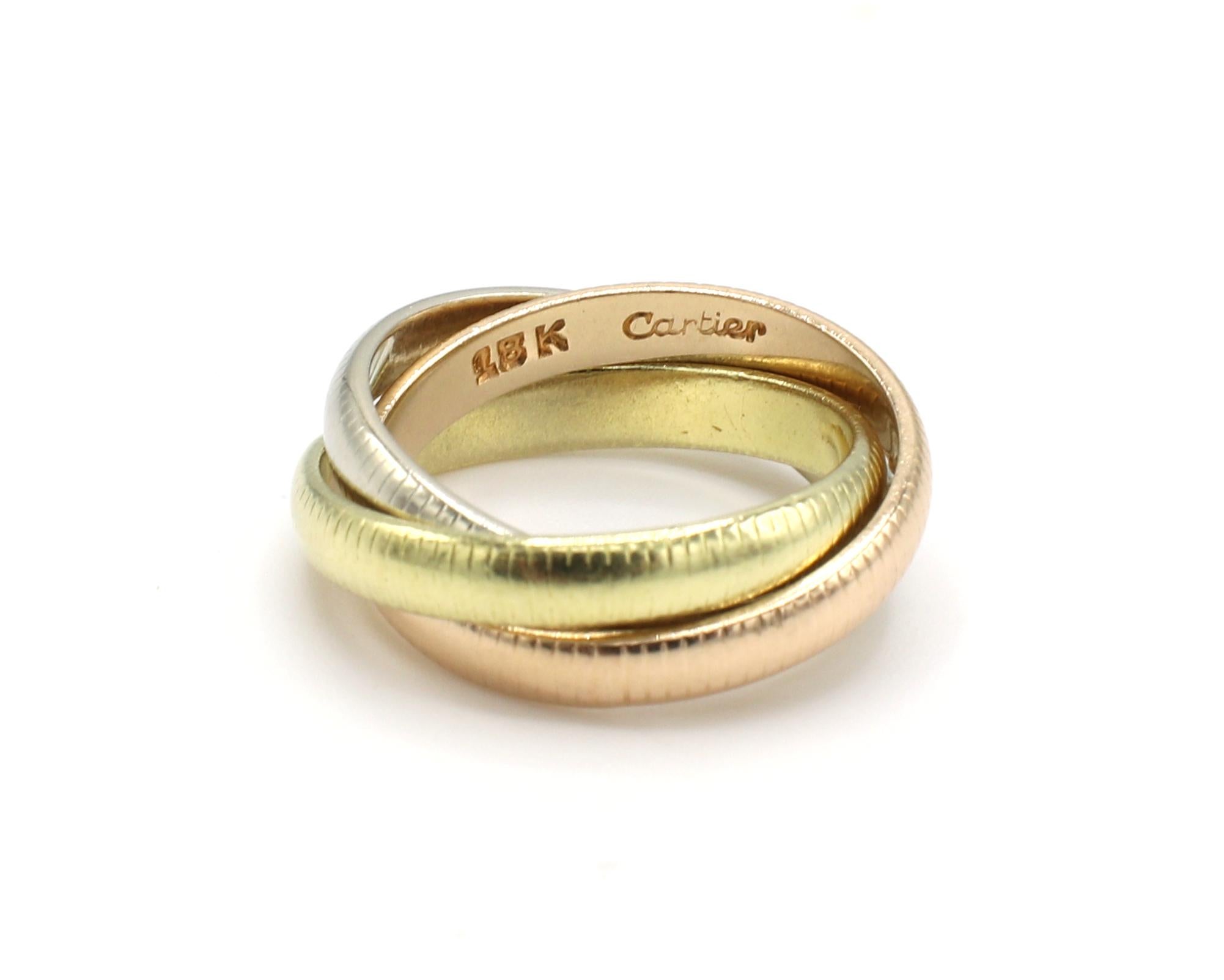 Cartier Vintage Tri-Color Trinity Rolling Ribbed Band Ring 
Metal: 18k white, yellow, rose gold
Weight: 5.50 grams
Width: Each ring is 2.5mm
Size: 2.5-3 (US) *pinky ring 
