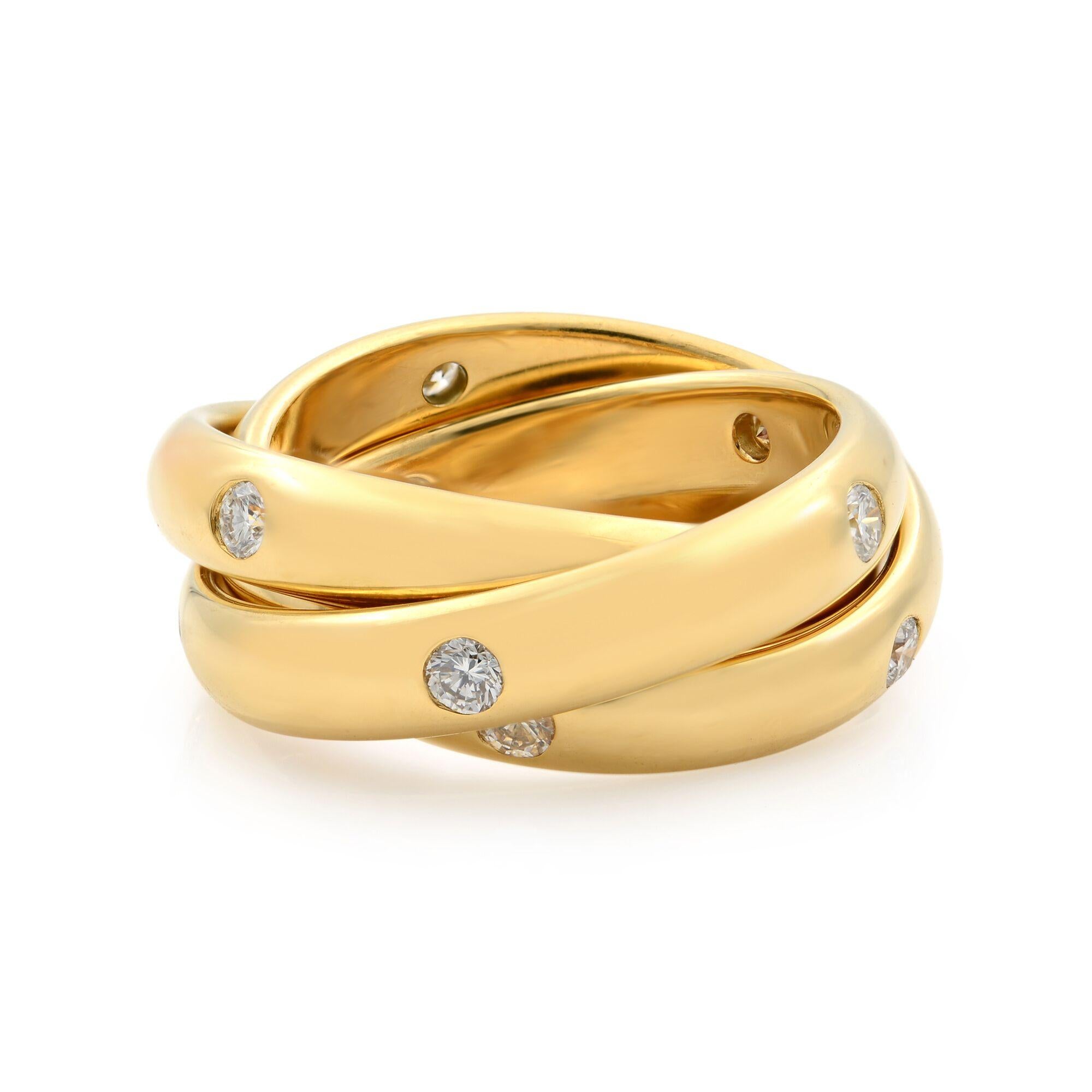 Vintage Cartier Trinity ring in 18 karat yellow gold and diamonds.
15 Round Cut Diamonds of F-G color and VS Clarity.
Each band is 4 mm.
Total Carat Weight: 0.45.
Stamped inside. Size 52 US 6.
Condition: Pre-owned, looks great. No signs of wear.