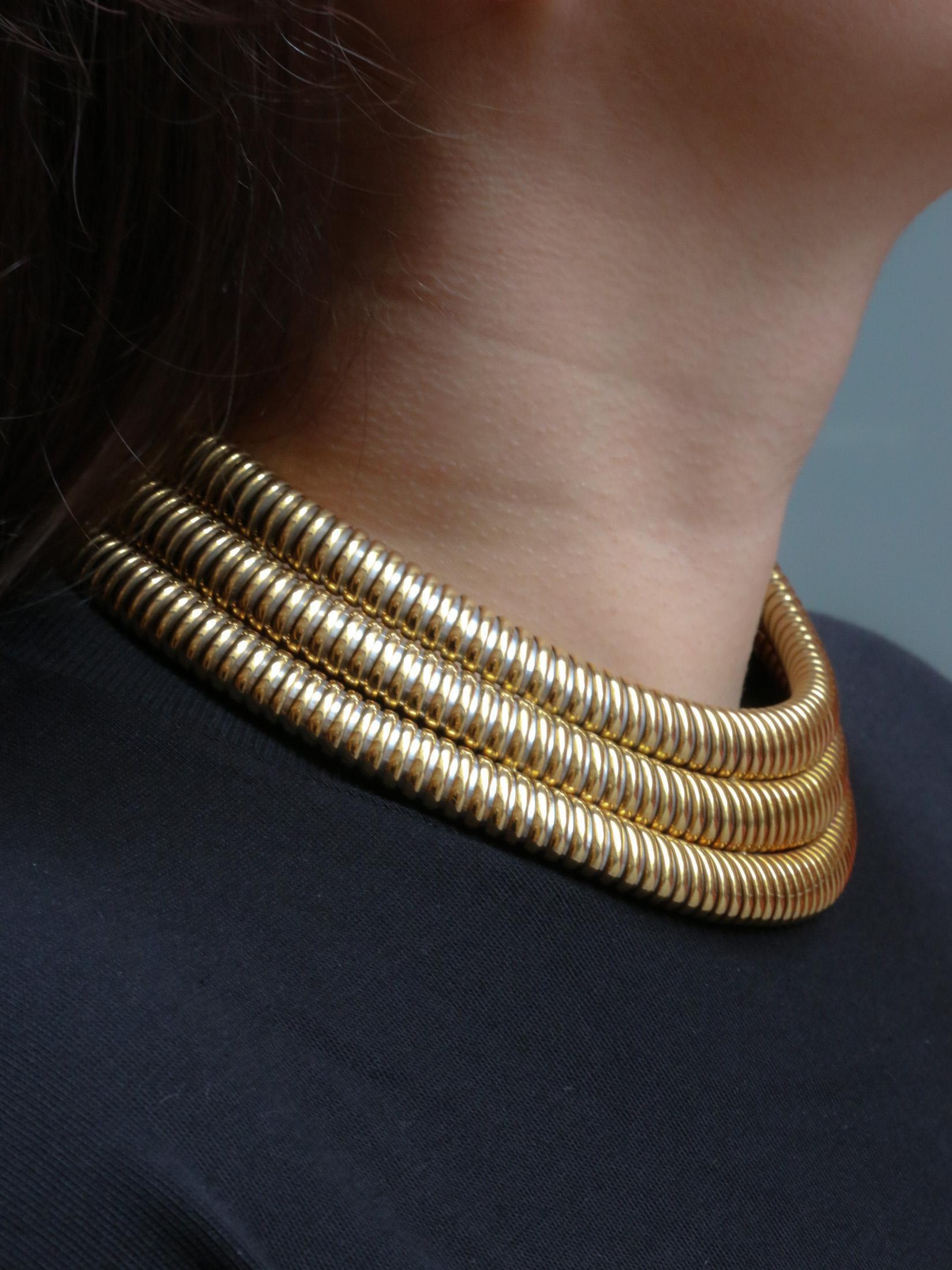 Cartier vintage gold and steel tubogas necklace

CARTIER - Cartier Africa tubogas three-row necklace in 18k( 750°/°°) gold and steel. Signed Cartier and numbered. French work dating from 1987. Presence of eagle head hallmark for 18k gold and maker's