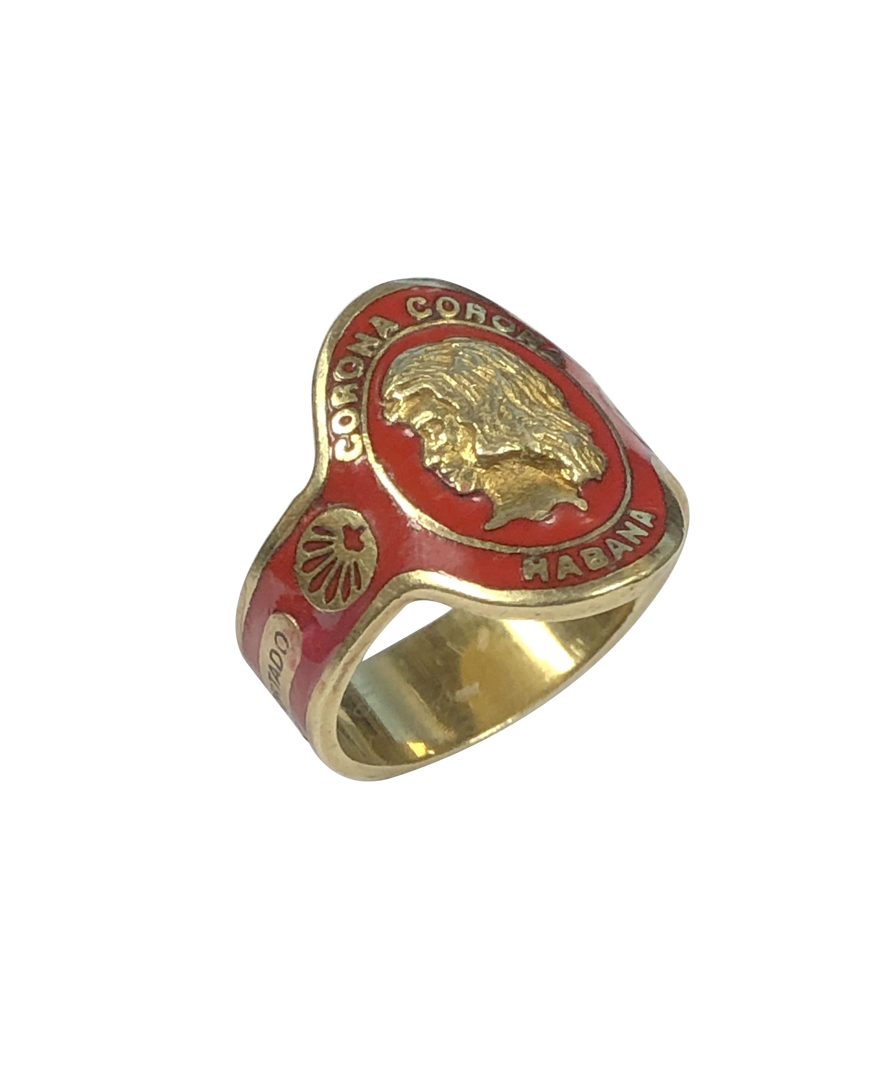 Circa 1960s Cartier Cigar Band Ring, 18k Yellow Gold with Red Enamel. The top of the ring measures 1/2 X 5/8 inch, finger size 5. Signed and numbered and comes in the original Cartier presentation box. 