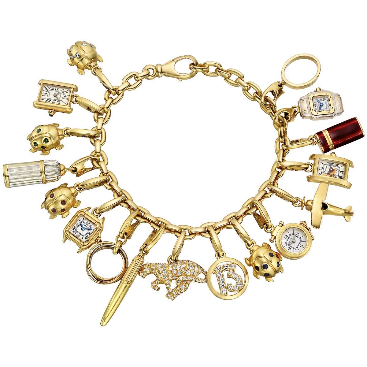 Cartier Vintage Yellow Gold Charm Bracelet at 1stDibs | cartier charm  bracelet, cartier charms, cartier charm bracelets