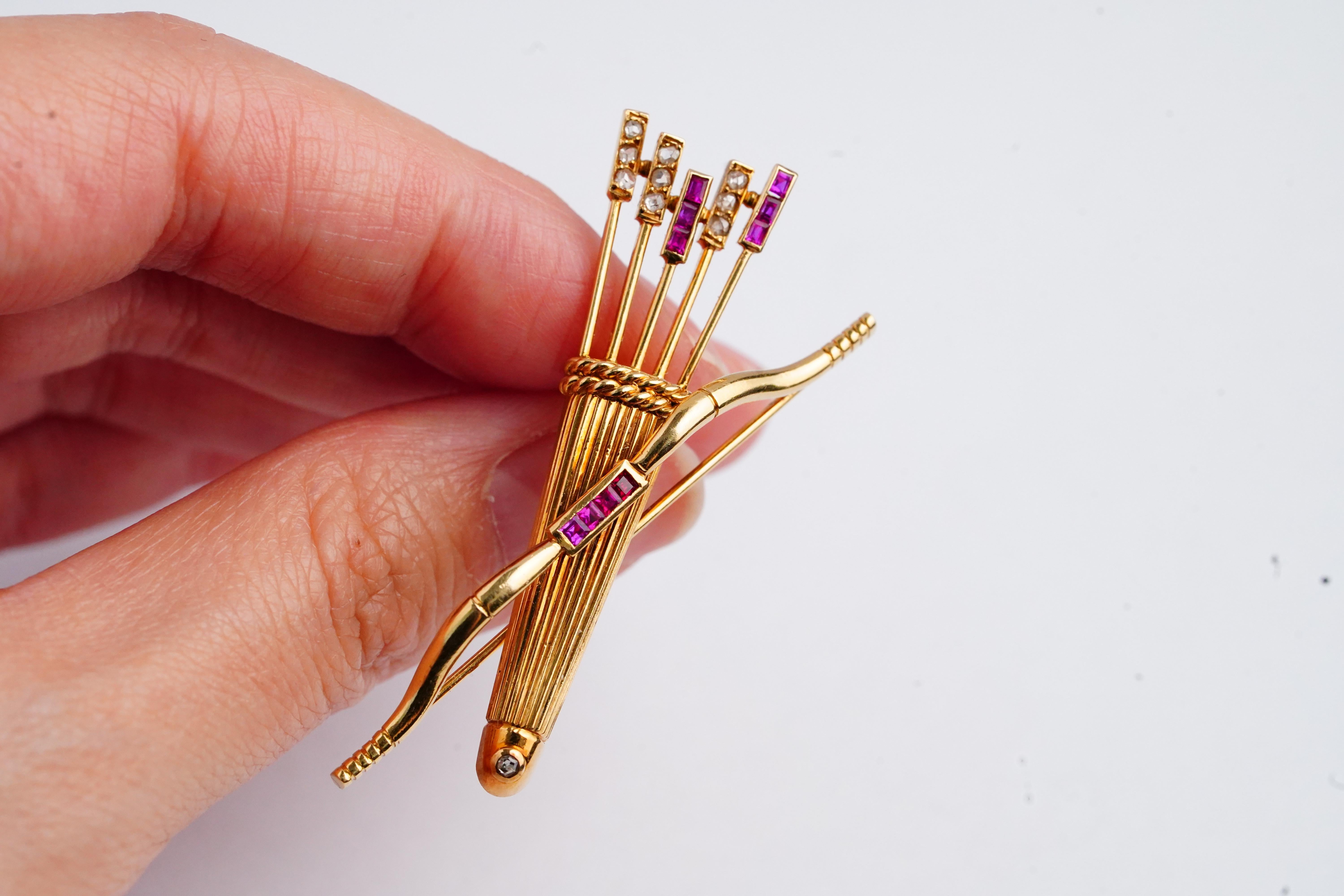 Contemporary Cartier Vintage Yellow Gold Diamond Ruby Bow and Arrows Pin Brooch For Sale