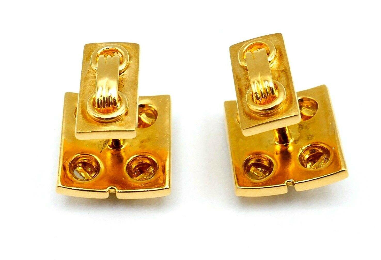 An elegant vintage pair of cufflinks with nautical motif made of 18k yellow gold by Cartier. 
Stamped with Cartier maker's mark and a hallmark for 18k gold.
Measurements: 5/8