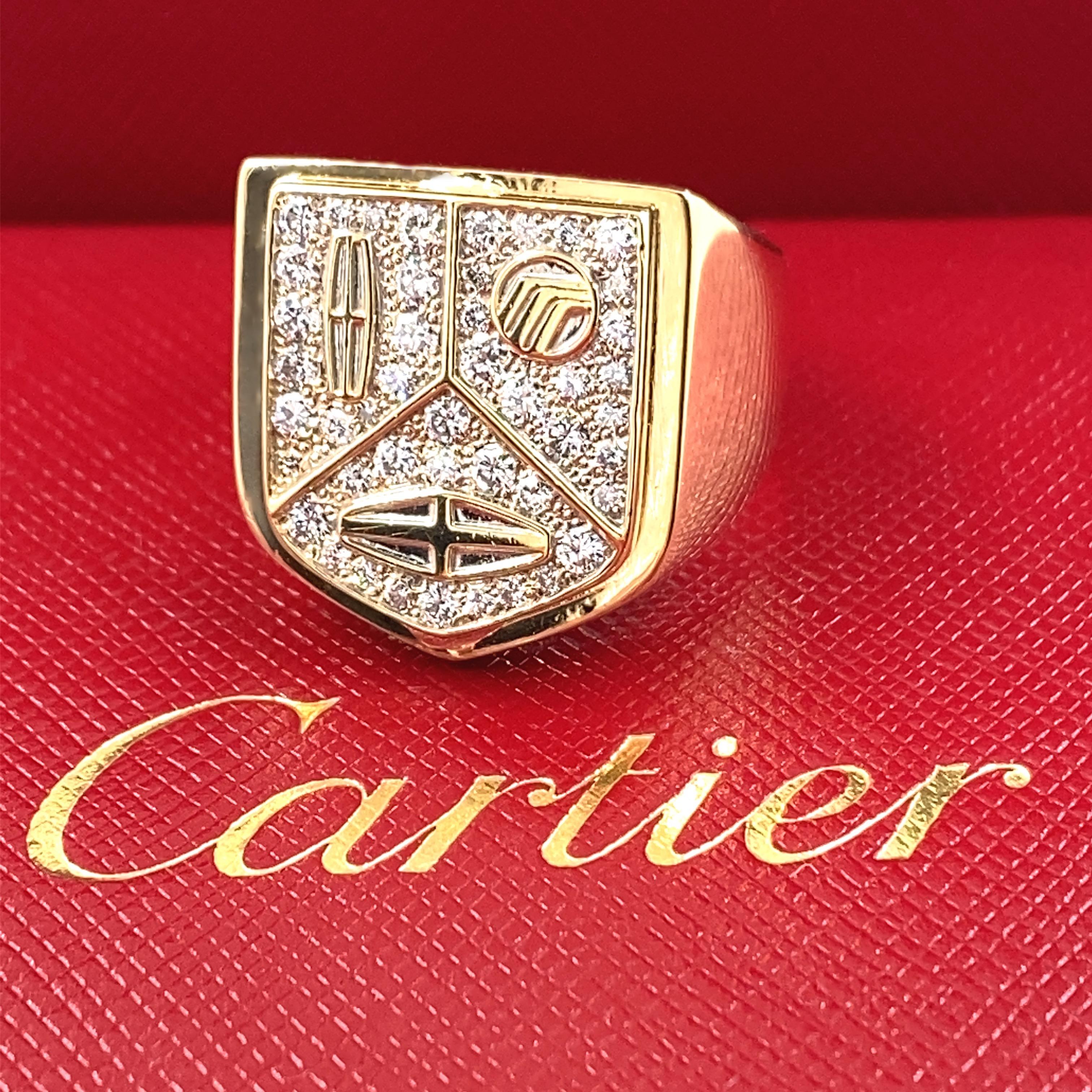 Vintage Circa 1985 Limited Edition Cartier Lincoln Mercury Merkur Diamond Signet Ring
Style:  Signet
Metal:  18kt Yellow Gold
Size:  9.5 sizable
TCW:  0.70 tcw
Main Diamond:  44 Round Brilliant Diamonds 0.70 tcw
Color & Clarity:  E - F, VS1 -